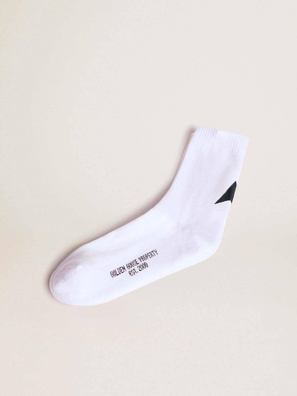 Golden Goose - Weiße Socken aus der Star Collection mit schwarzem Kontraststern in 