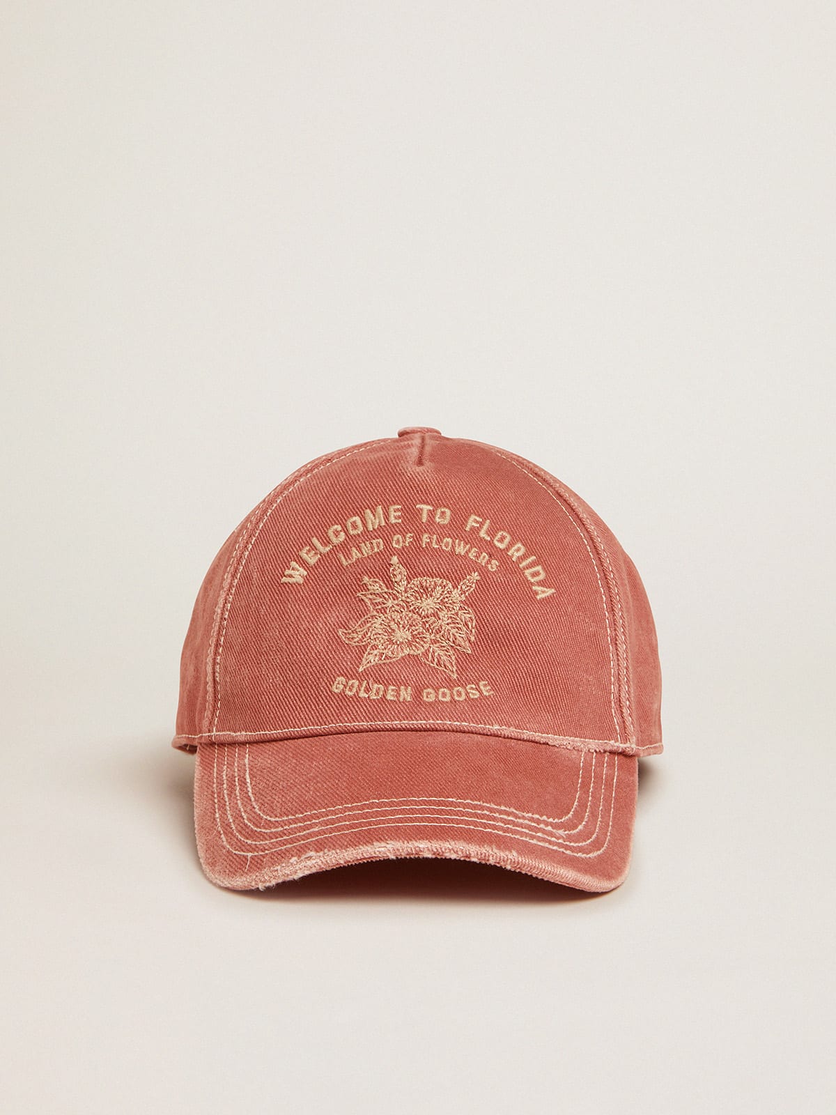 Golden Goose - Pale mauve Journey Collection baseball cap with a distressed effect and white embroidery on the front in 