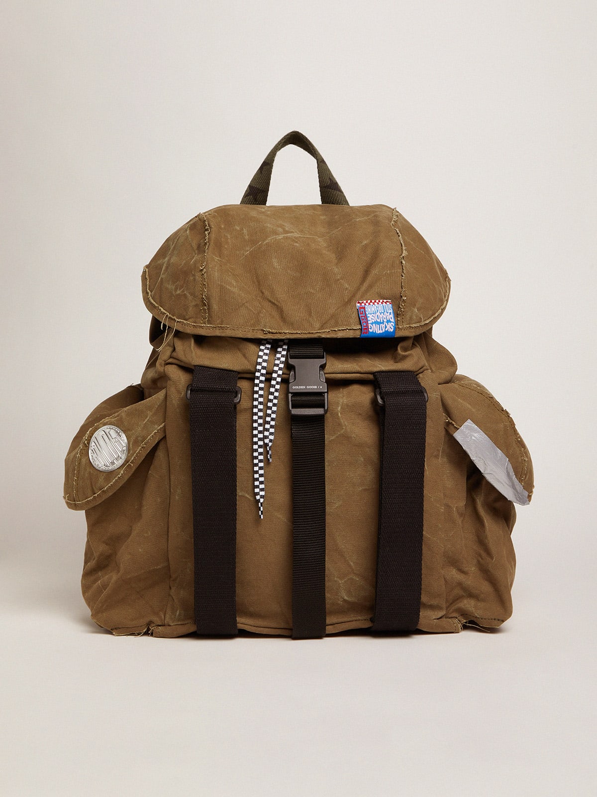 Dreamer backpack in military green fabric with side pockets