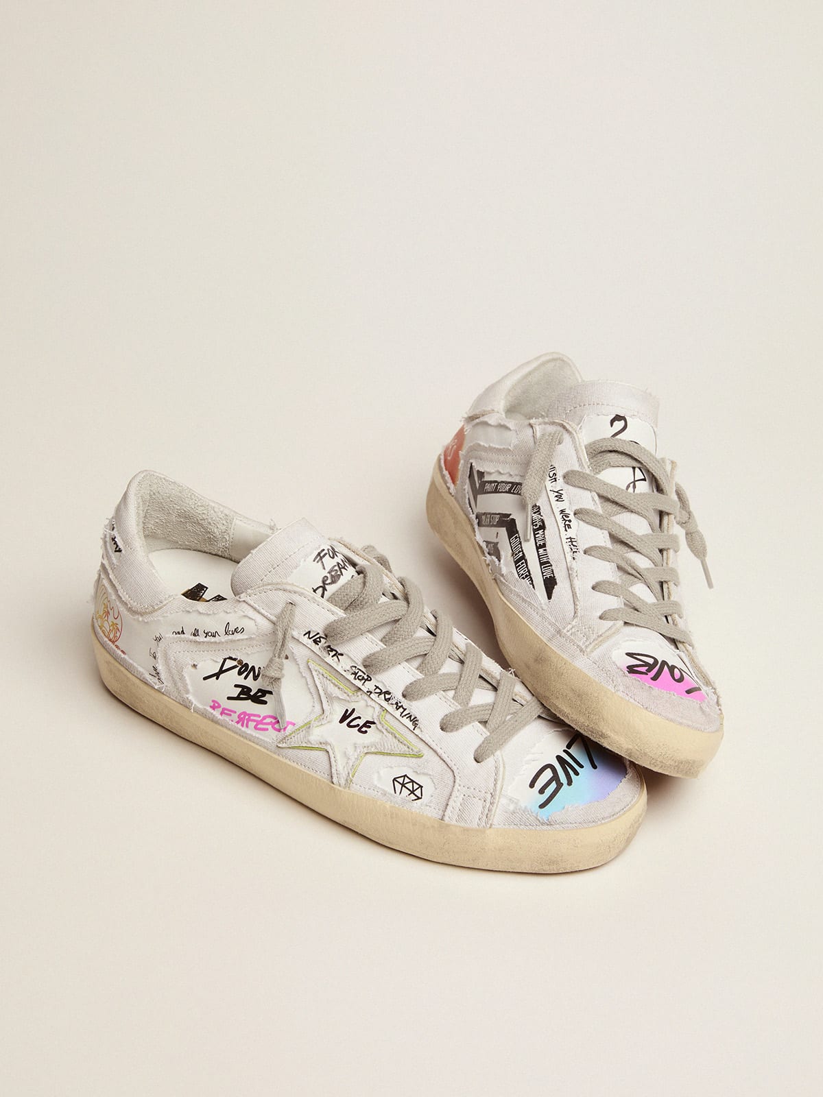 Golden Goose - Super-Star Dream Maker sneakers in white color with reverse construction and hidden multicolor details in 