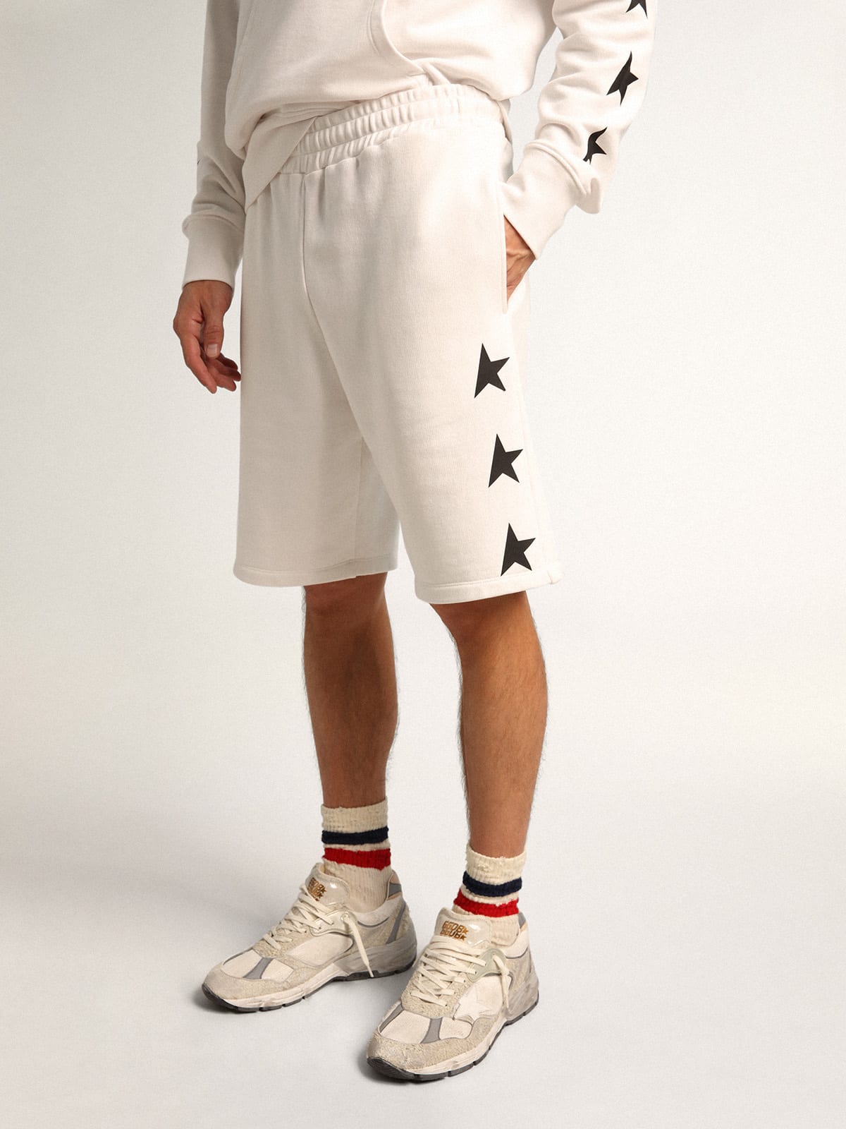 Golden Goose - Men's vintage white bermuda shorts with contrasting black stars in 