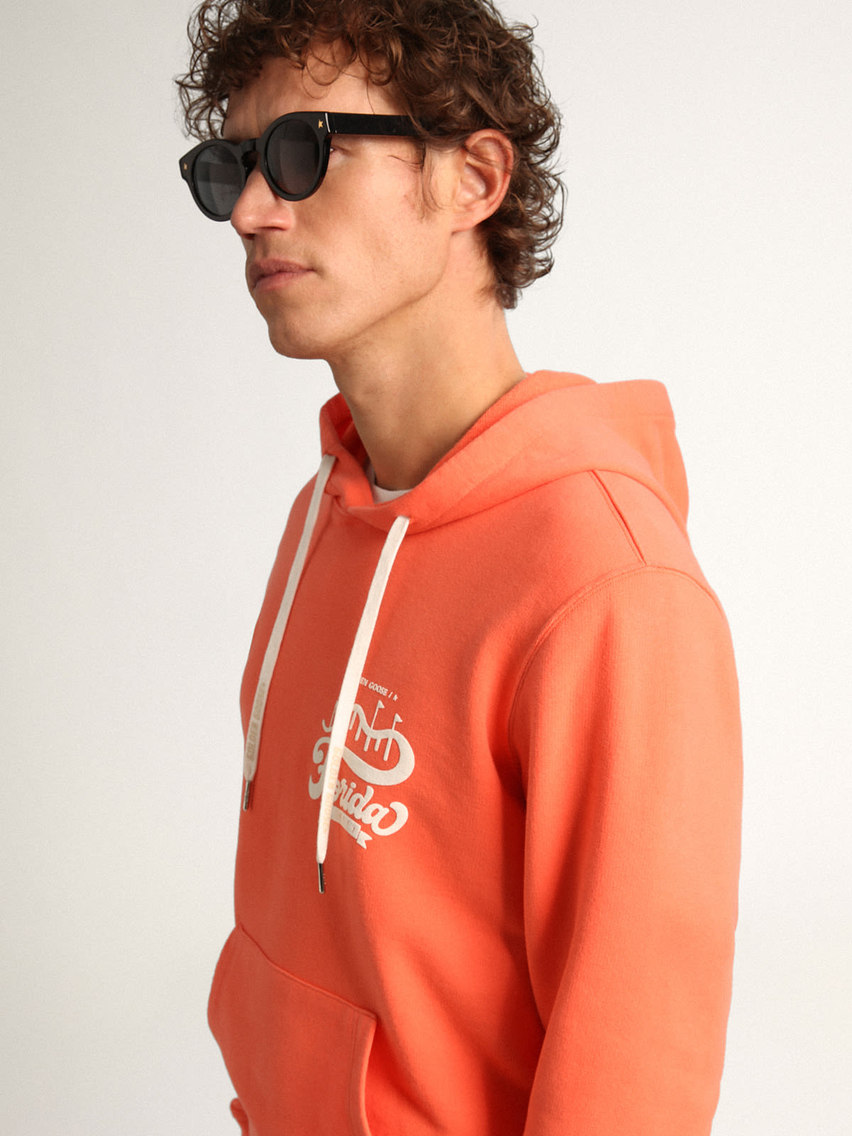 Golden Goose - Coral-colored Journey Collection sweatshirt with double white print on the back in 