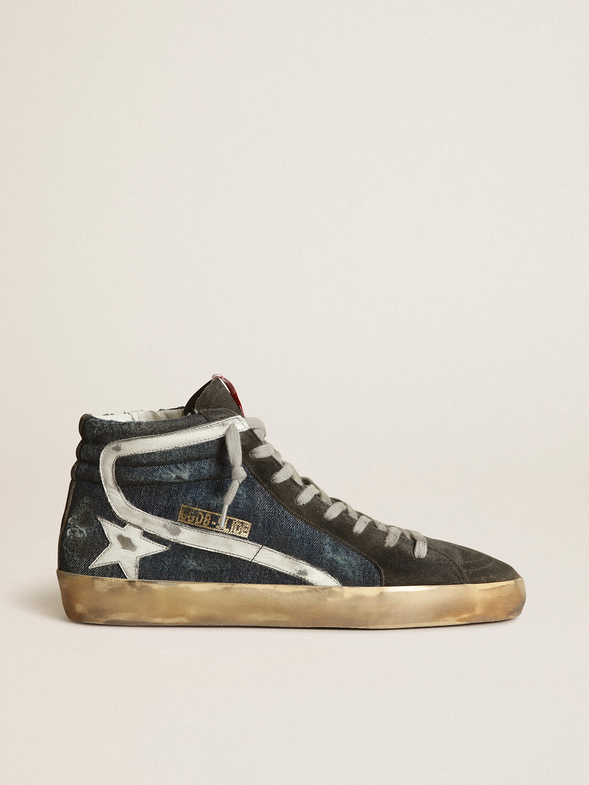 Slide sneakers in midnight-blue denim with white leather star