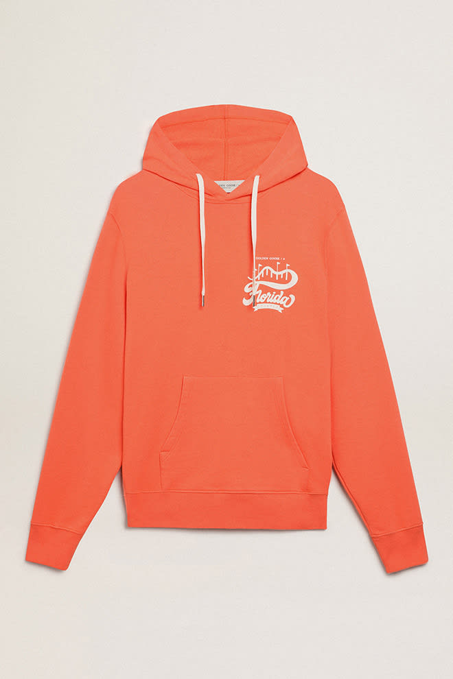 Sudadera de la colecci n Journey en color coral con doble estampado blanco en la espalda