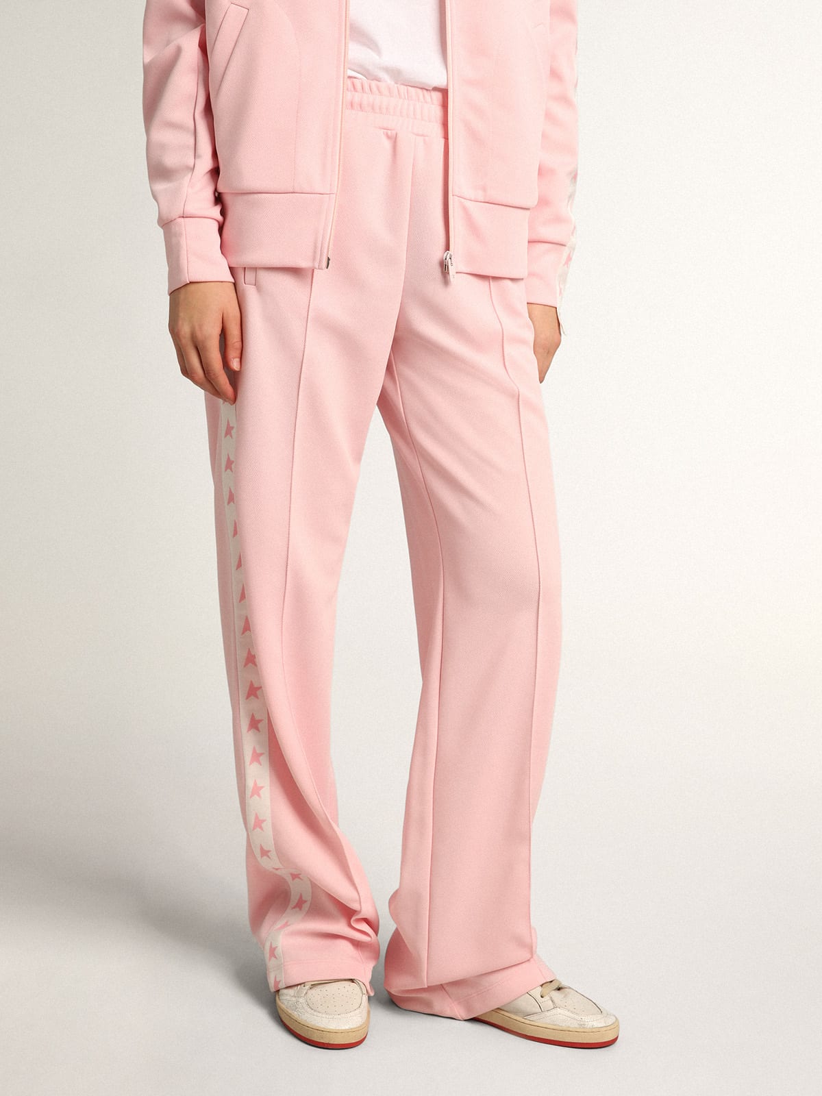 Golden Goose - Pantalón jogger Dorotea de la colección Star en color rosa con banda blanca y estrellas rosa en los lados in 
