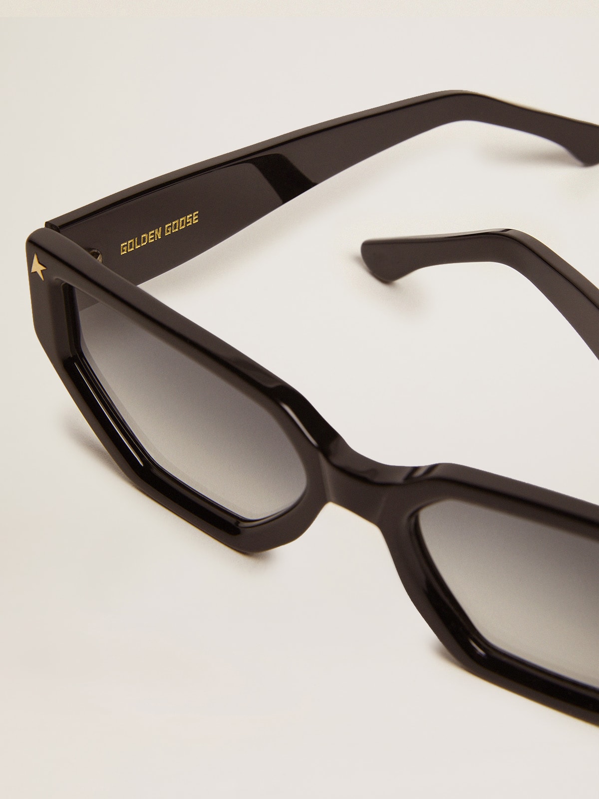 Golden Goose - Rectangular-style Sunframe Jackie with black frame and gold details in 