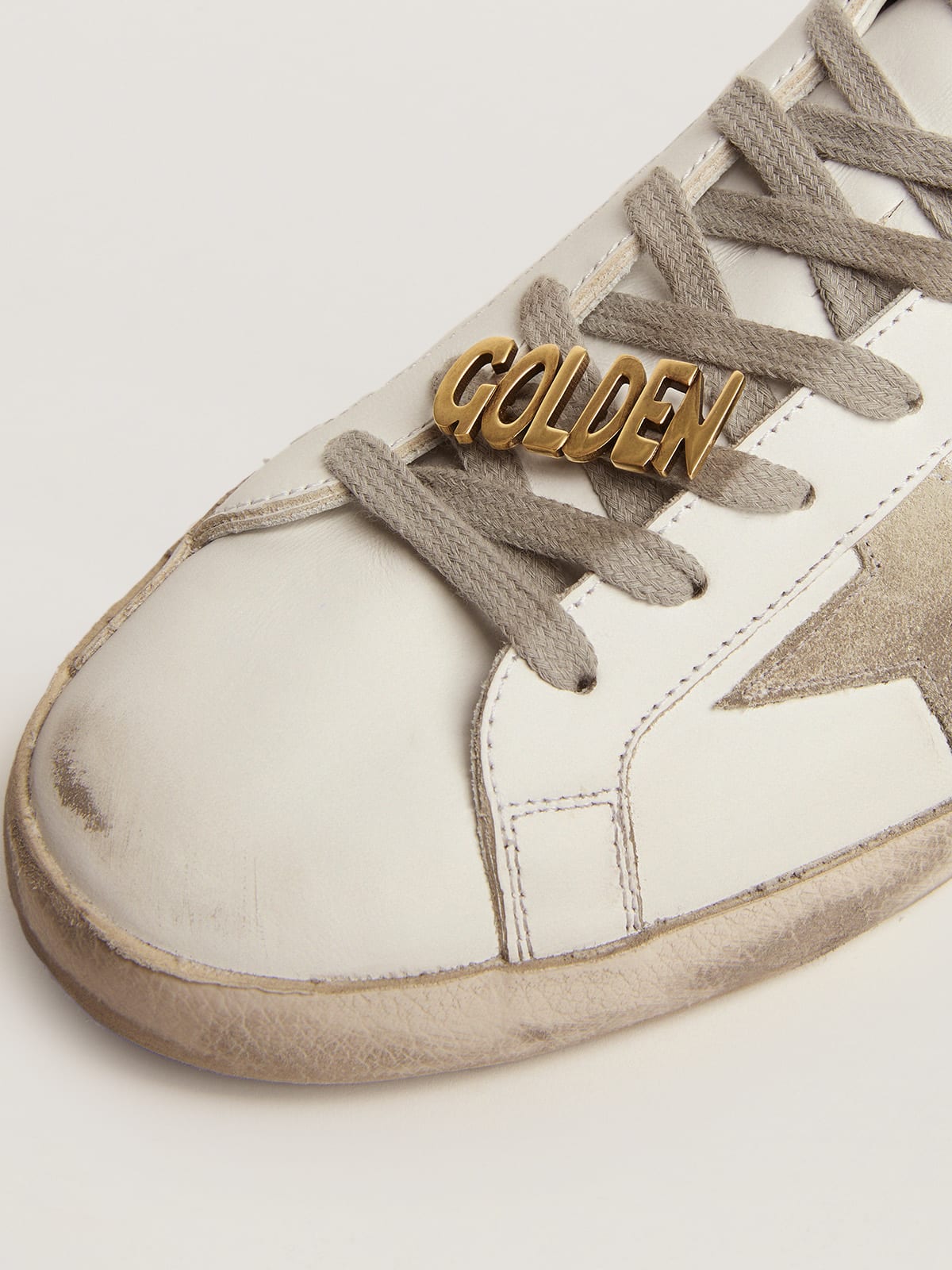 Golden Goose - Men's lace lock with clip in old gold color with Golden lettering in 
