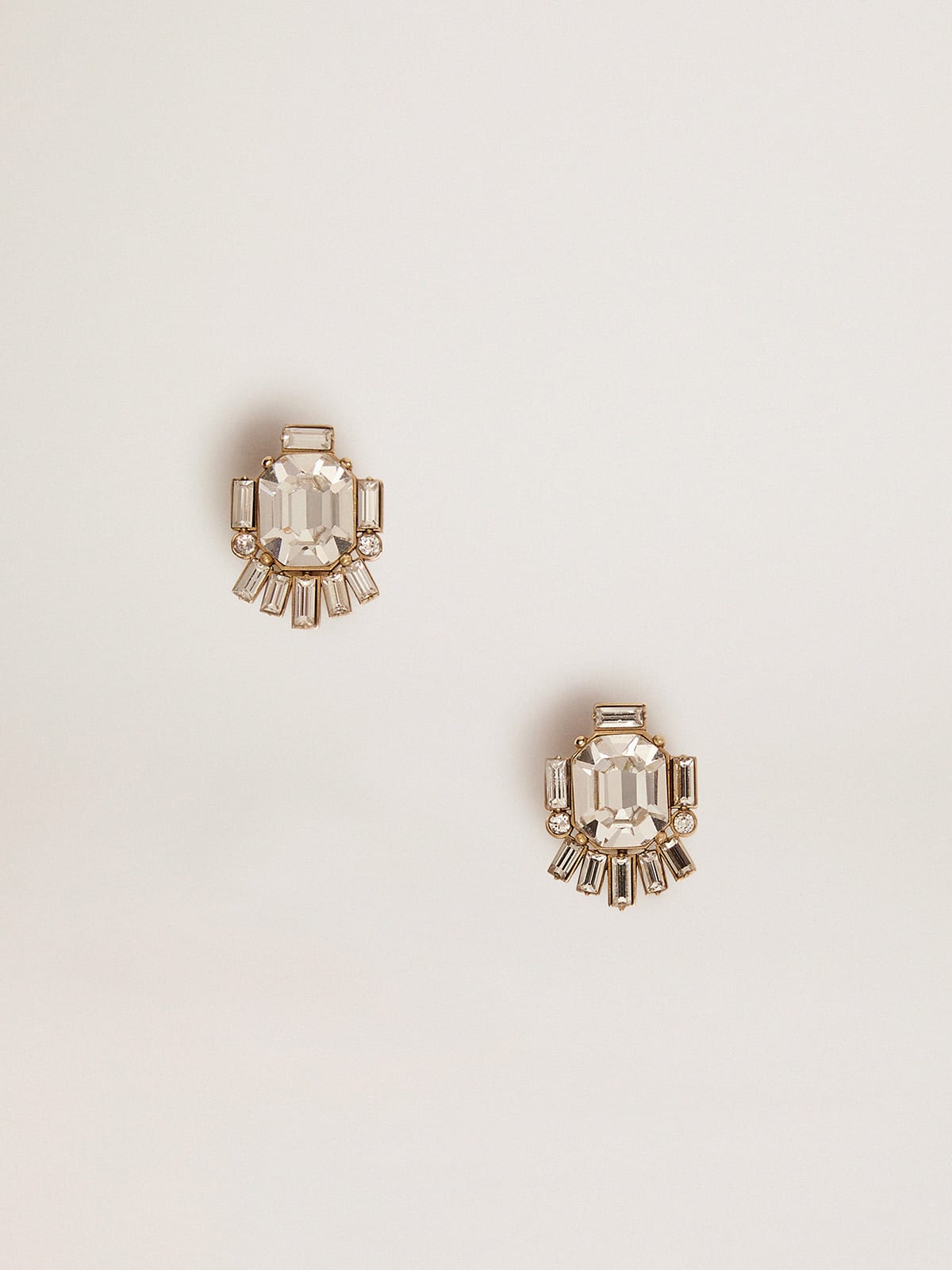 Golden Goose - Stud earrings in old gold color with decorative crystals in 