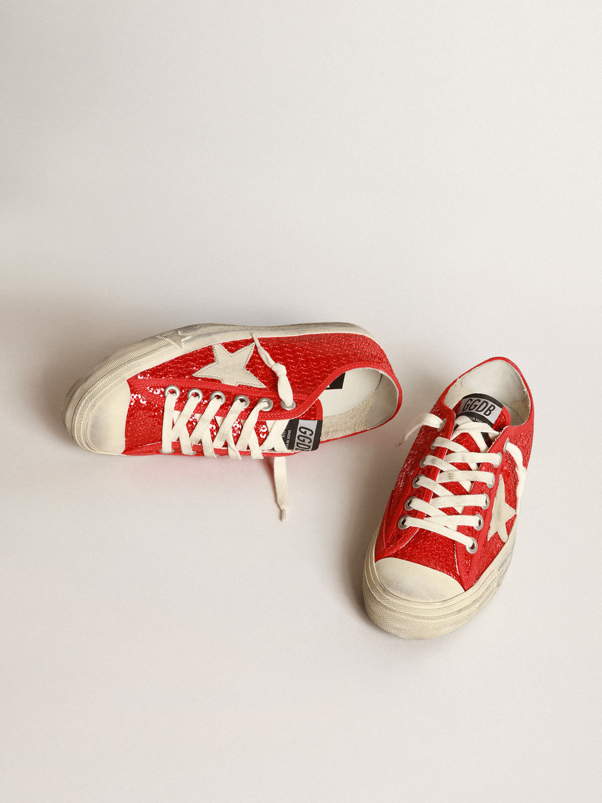 Golden Goose - V-Star sneakers in red sequins with cream-colored leather star and red grosgrain heel tab in 