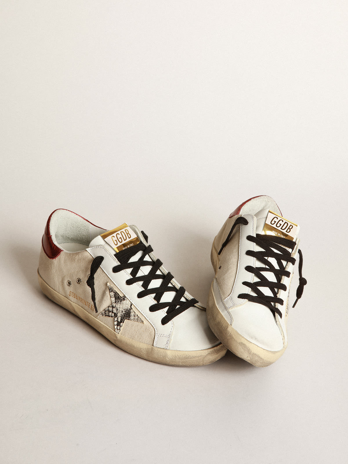 Golden Goose - Super-Star LTD sneakers in natural-white canvas with gray snake-print leather star and burgundy laminated leather heel tab in 