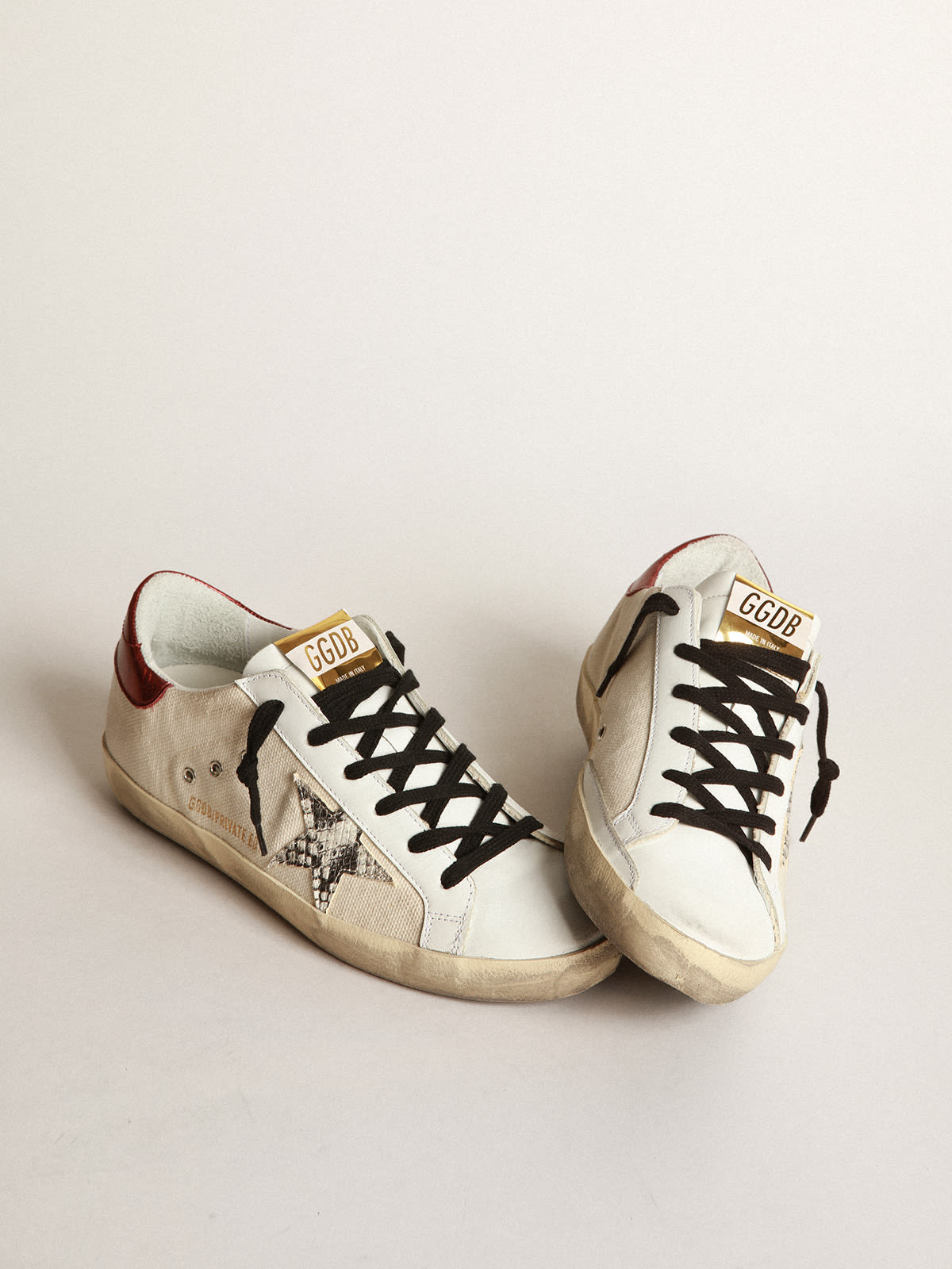 Super-Star LTD sneakers in natural-white canvas with gray snake-print  leather star and burgundy laminated leather heel tab | Golden Goose