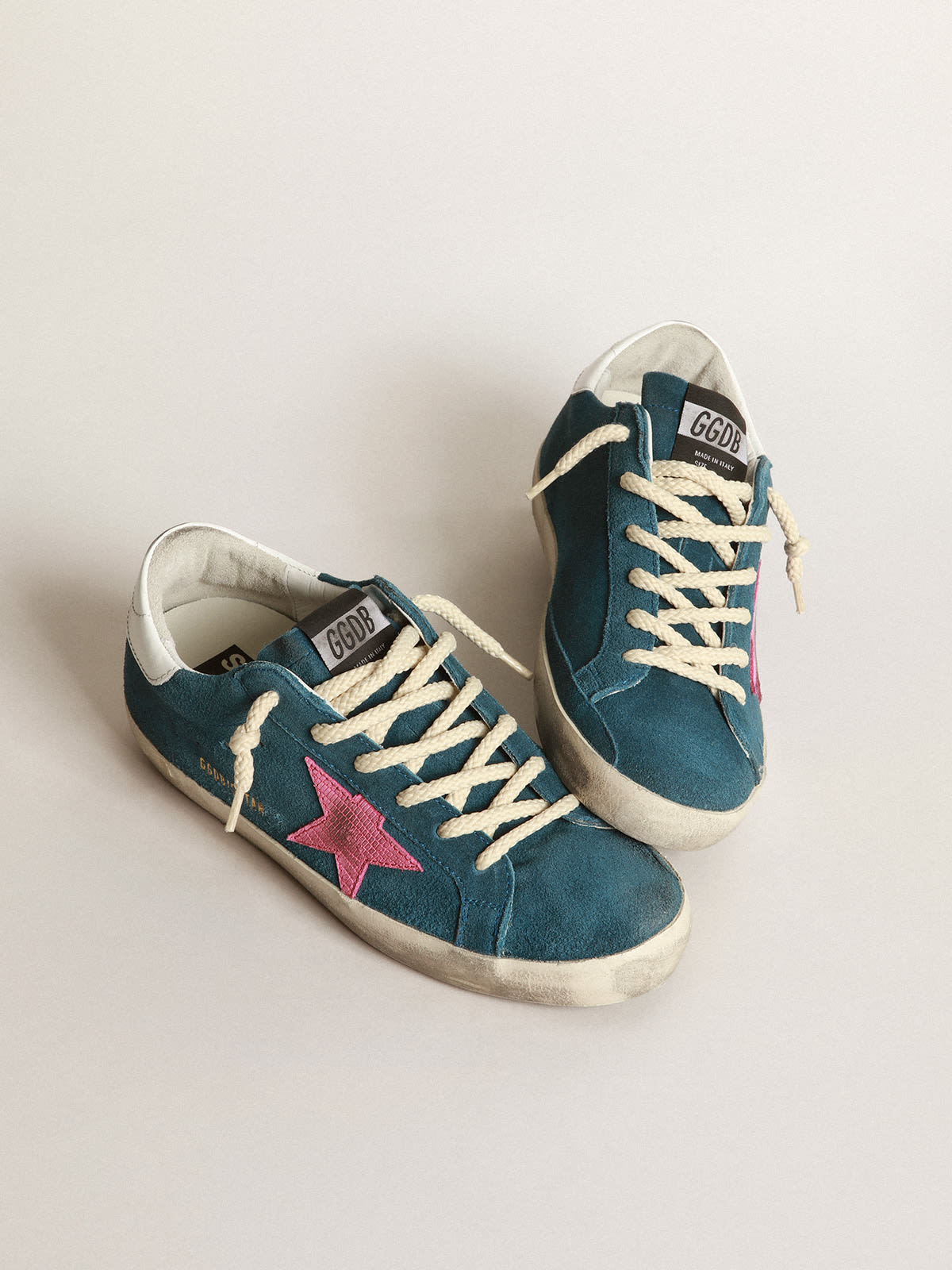 Pink and store blue golden goose