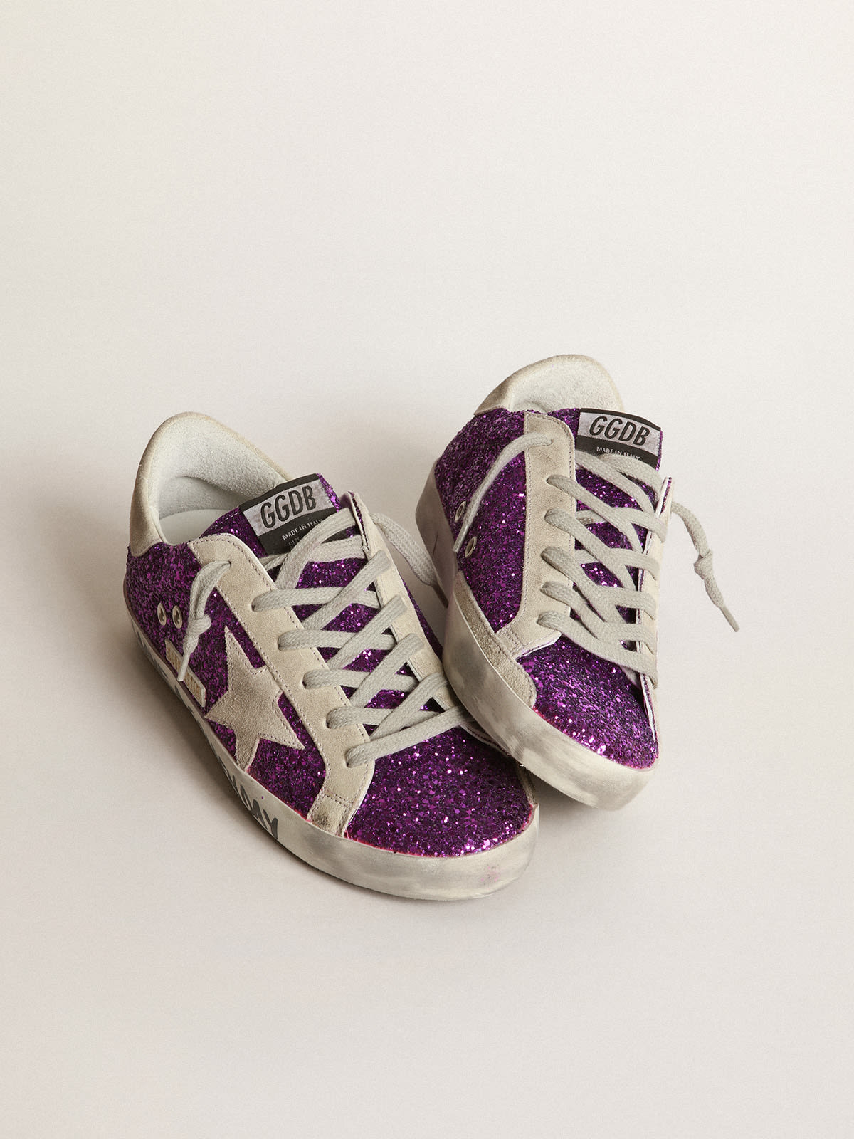 Golden Goose - Super-Star sneakers with purple glitter and lettering on the foxing in 