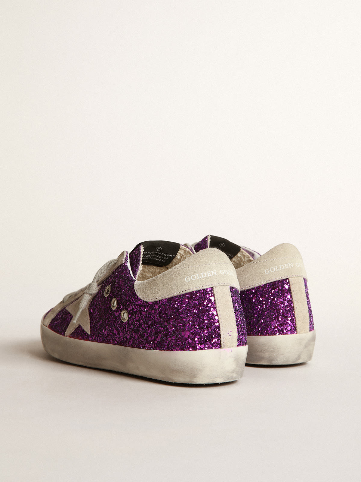 Golden Goose - Super-Star sneakers with purple glitter and lettering on the foxing in 