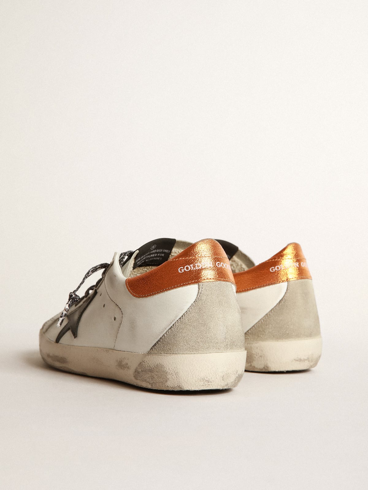 Golden Goose - White Super-Star sneakers with black star and leopard-print laces in 