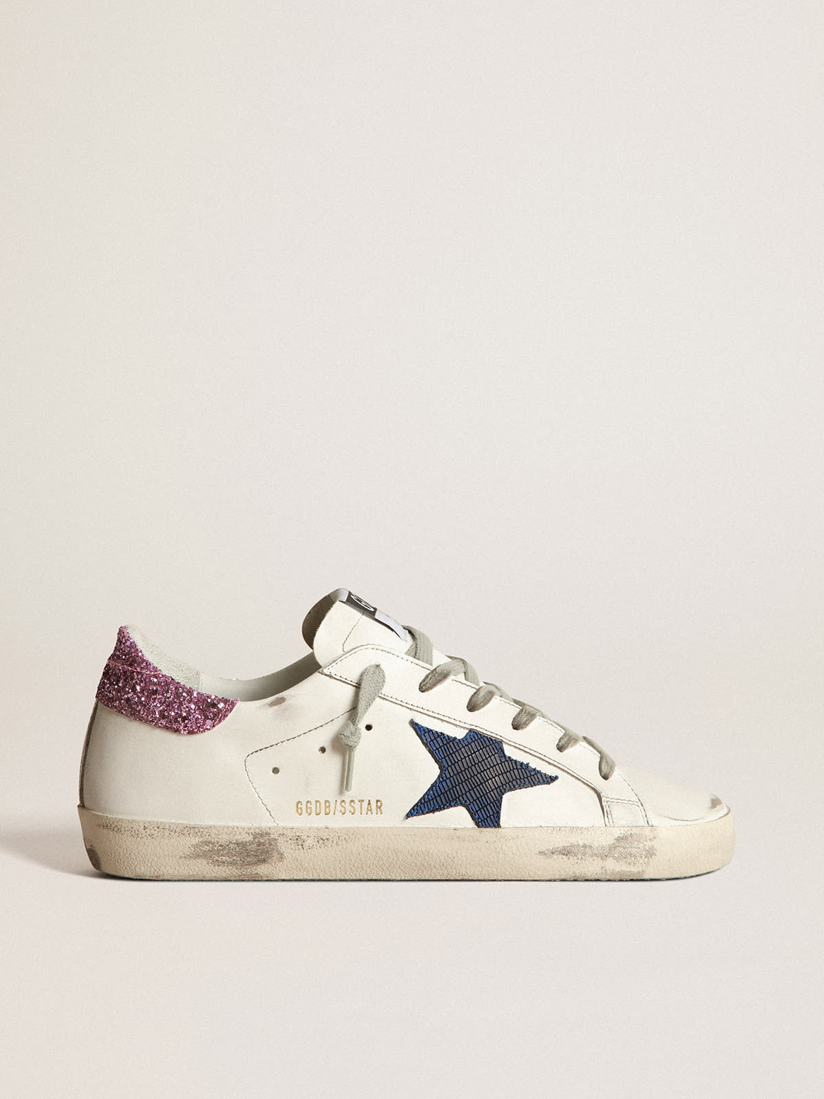 Golden Goose - White Super-Star sneakers with blue star and glittery heel tab in 