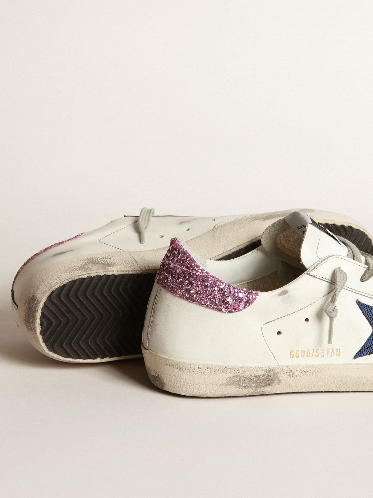 Golden Goose - White Super-Star sneakers with blue star and glittery heel tab in 
