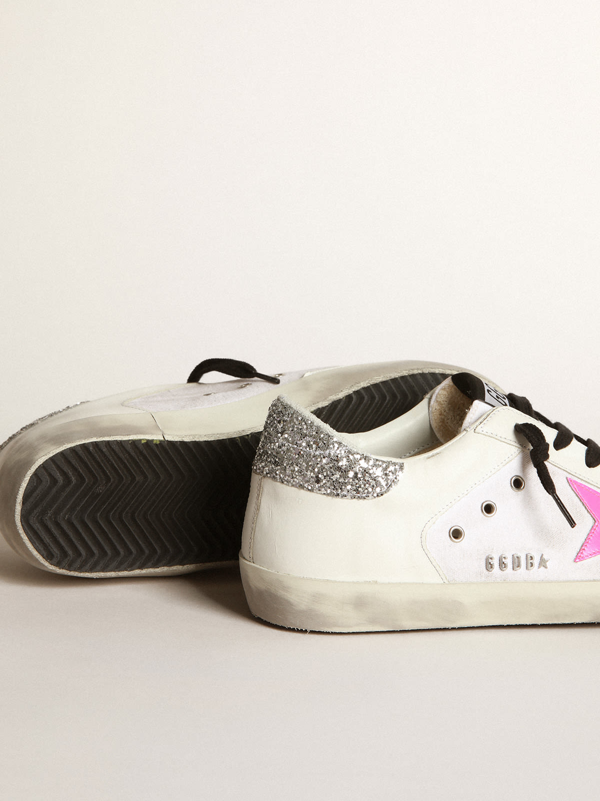 Super-Star sneakers in white leather and canvas with shocking-pink leather  star and silver glitter heel tab