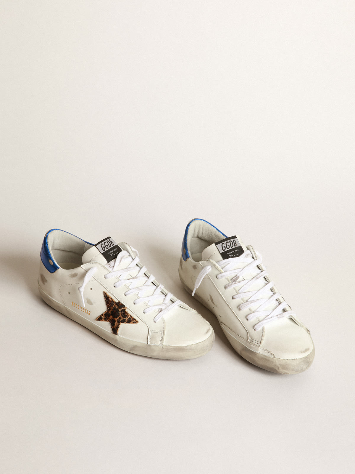 Super Star sneakers with leopard print star and blue heel tab