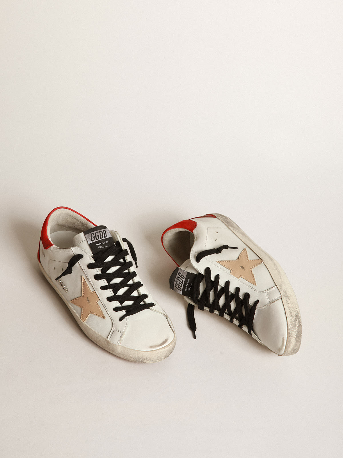 Golden Goose - White Super-Star sneakers with red rear and black laces in 