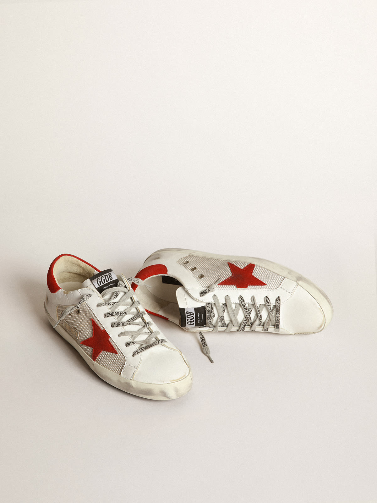 Sneakers Superstar blanches en cuir avec toile rouge Golden Goose