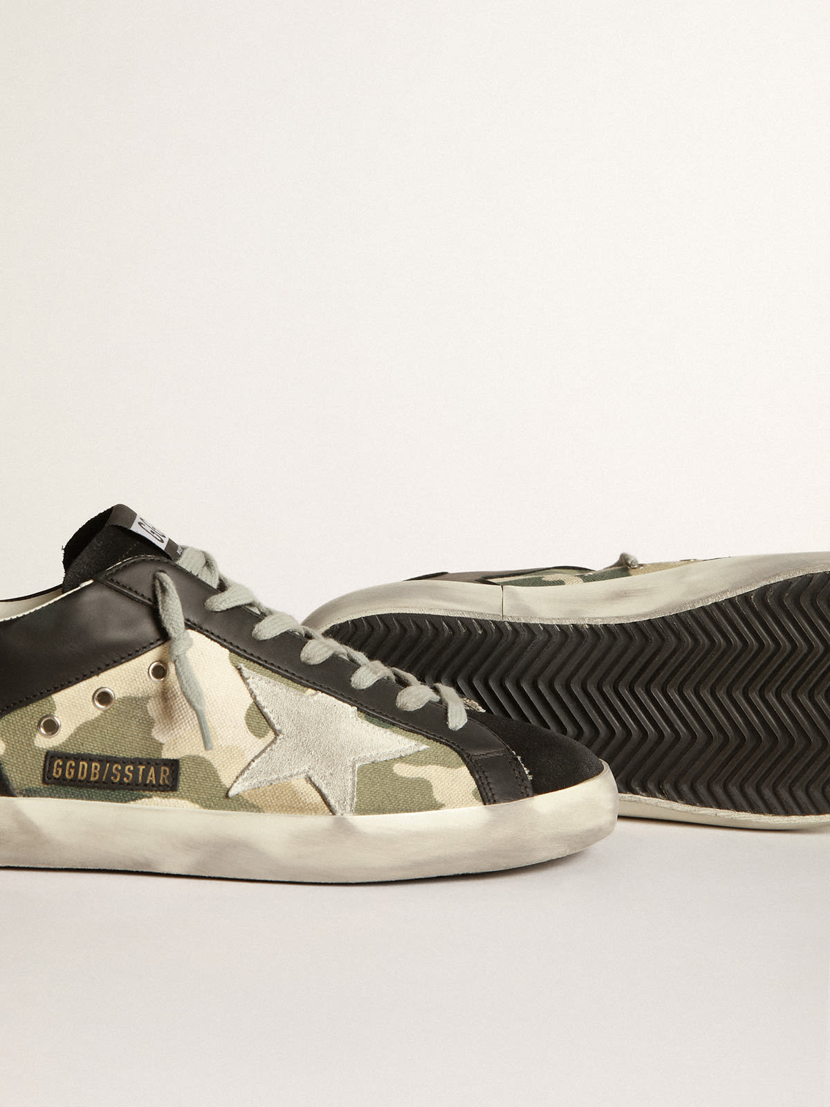 Super-Star sneakers in black leather and camouflage canvas | Golden Goose