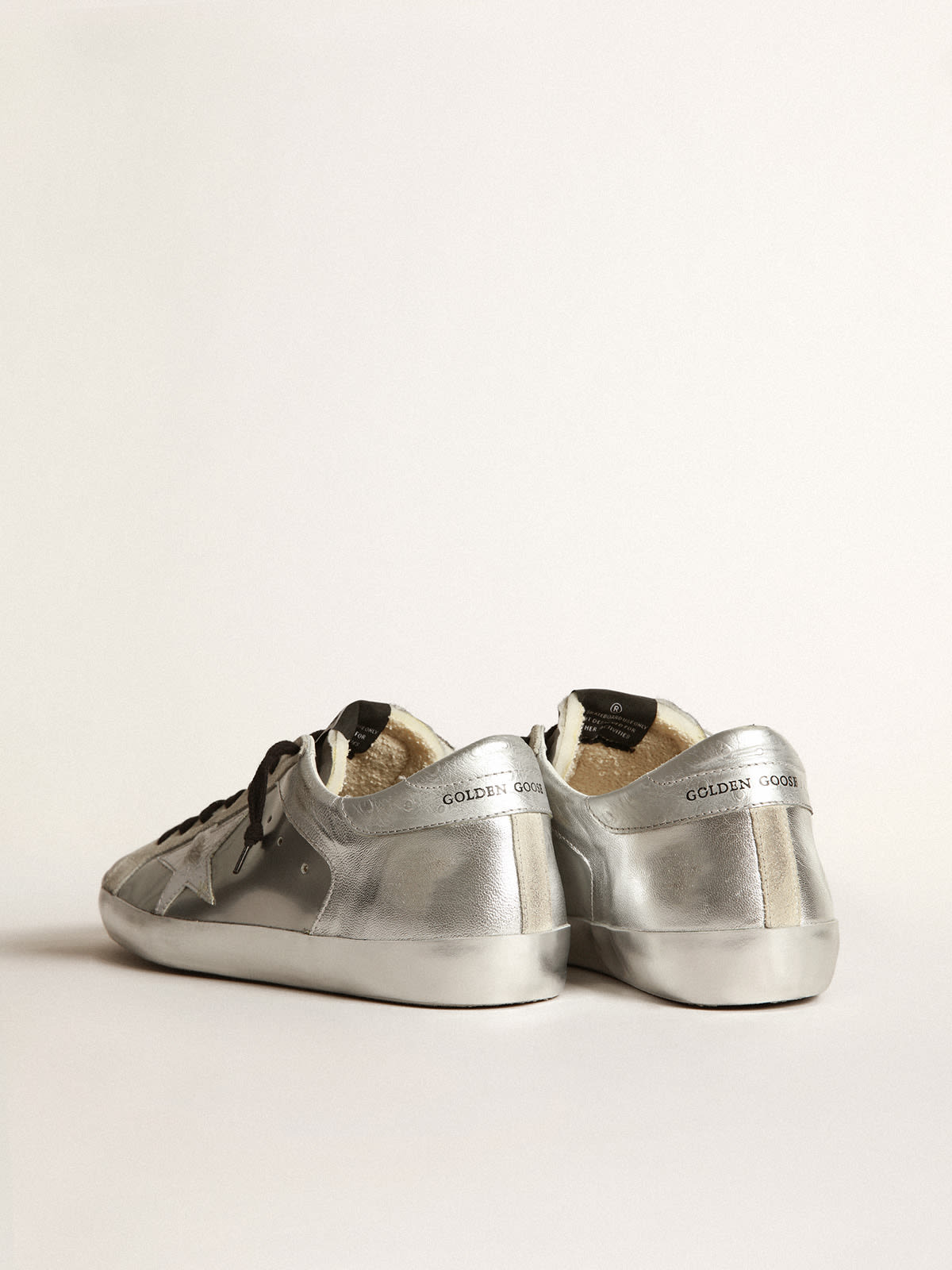 Golden goose silver superstar on sale sneakers