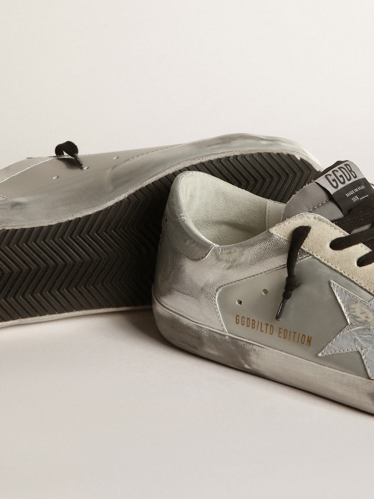 Golden Goose - Super-Star LTD sneakers in silver leather with white crackle leather star and gray ostrich-print leather heel tab in 