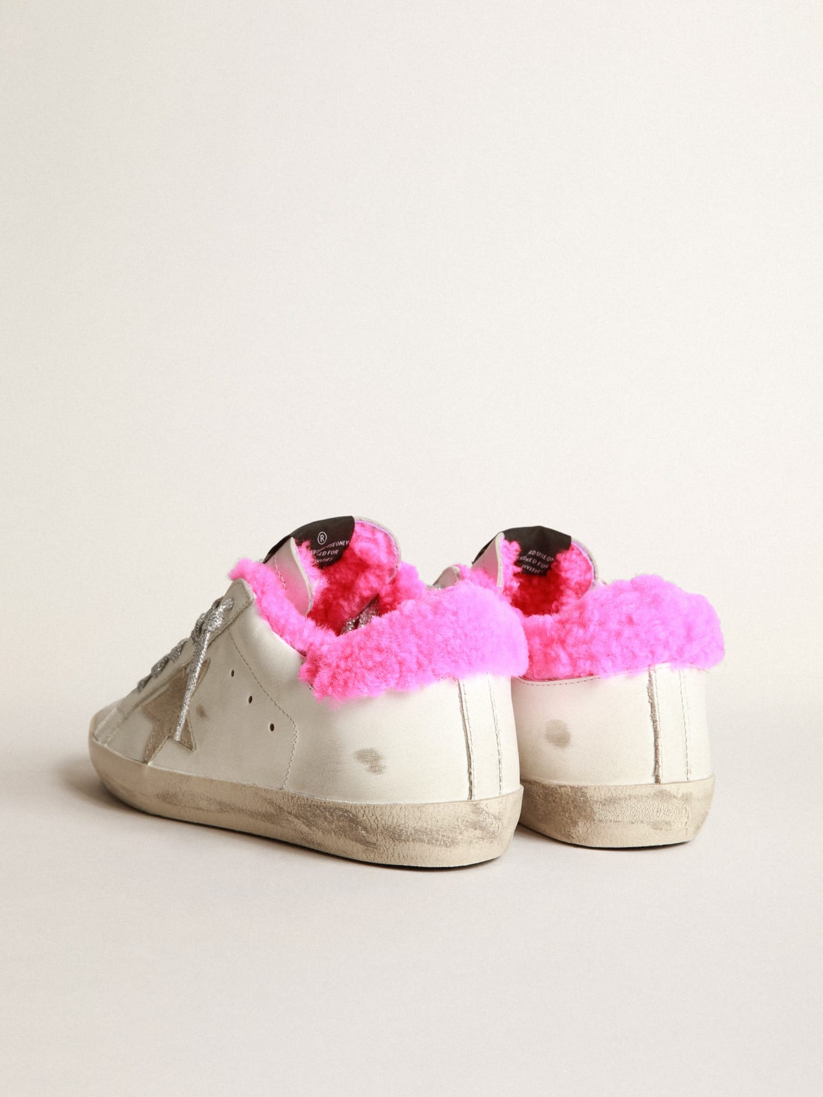 Super-Star sneakers with fuchsia shearling lining and ice-gray suede star