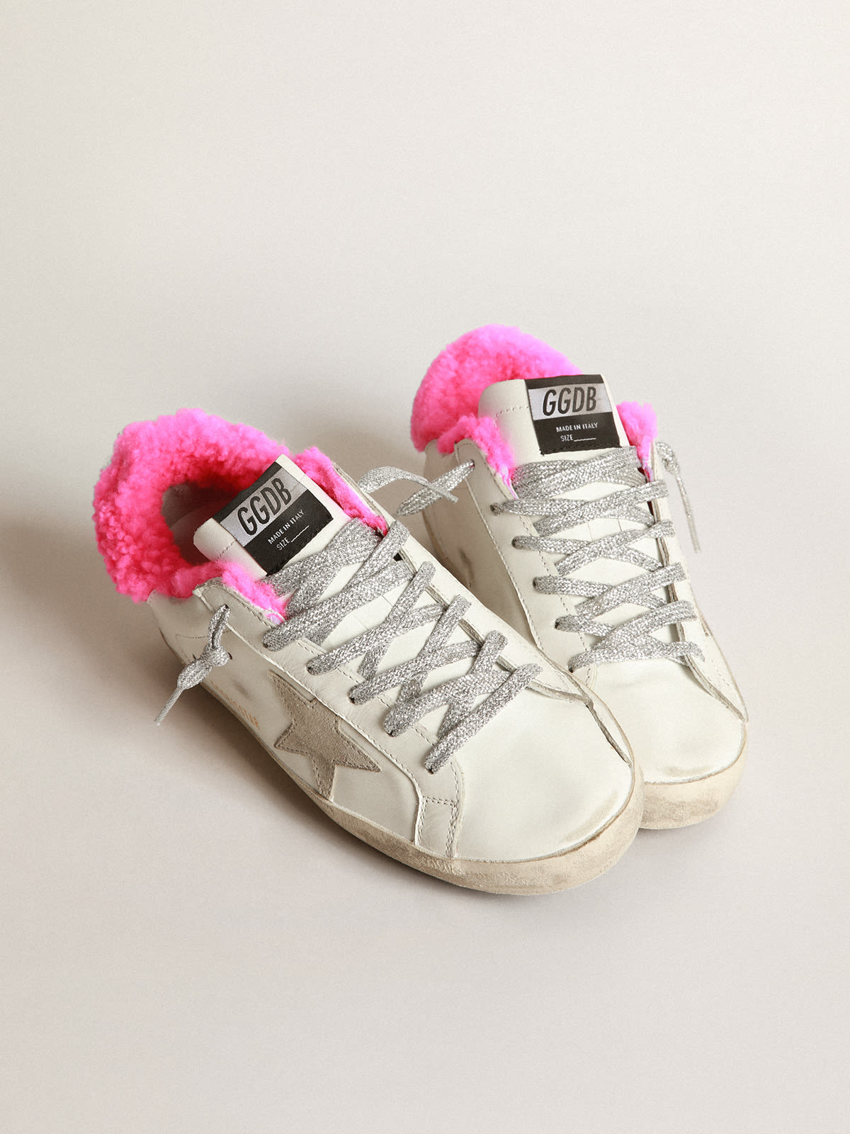 Super-Star sneakers with fuchsia shearling lining and ice-gray suede star