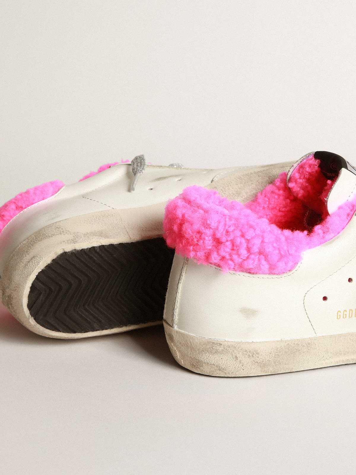 Super-Star sneakers with fuchsia shearling lining and ice-gray suede star |  Golden Goose