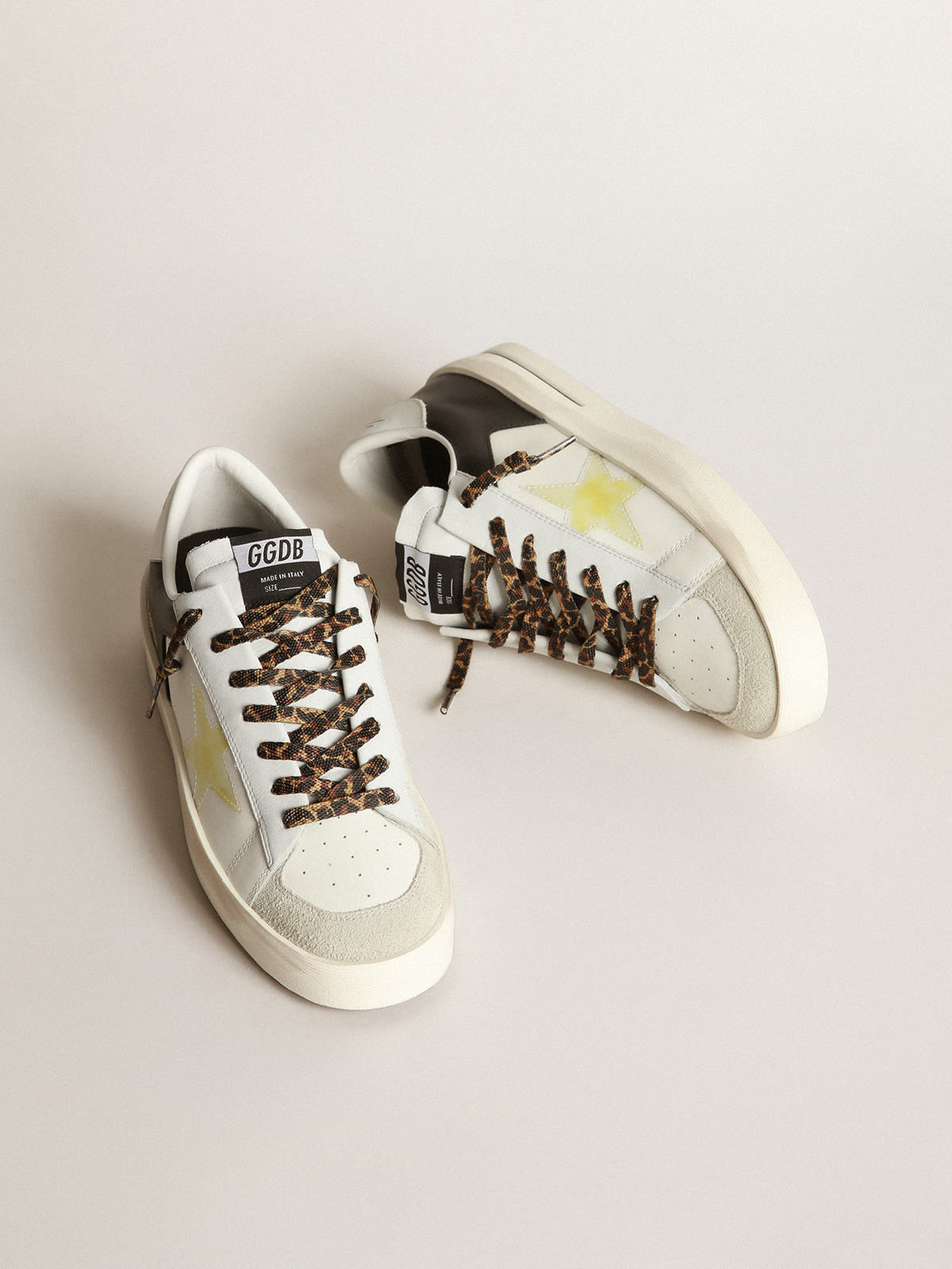 Golden Goose - Stardan LTD sneakers in black and white leather with yellowed-effect transparent PVC star in 