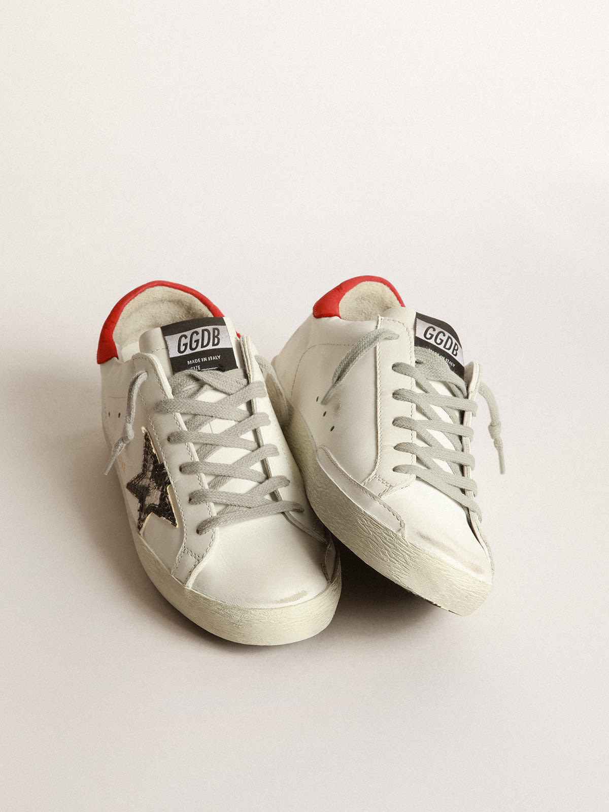 Super-Star sneakers with snakeskin-print star and red heel tab | Golden  Goose