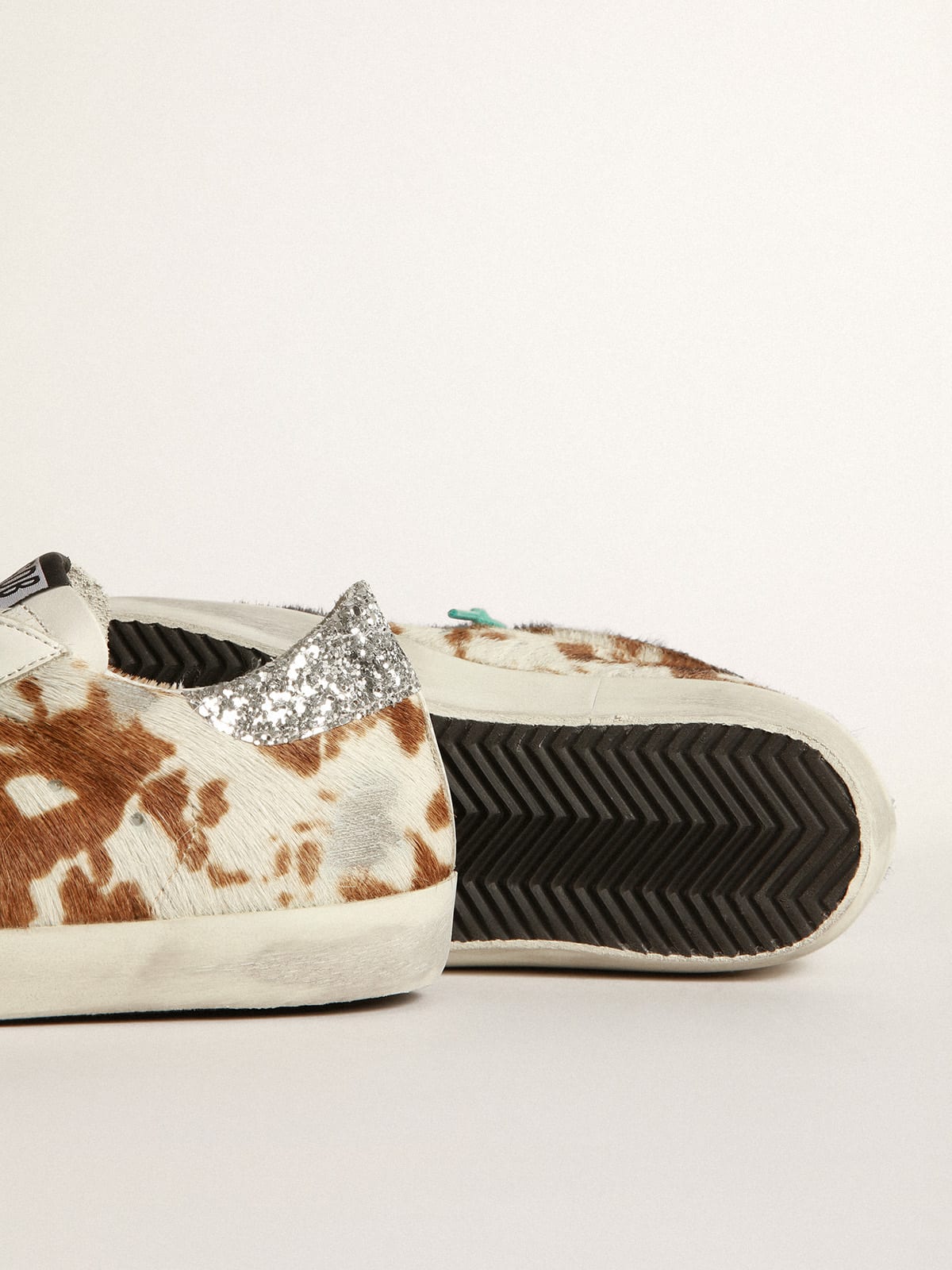 Cow-print Super-Star sneakers with glittery heel tab | Golden Goose