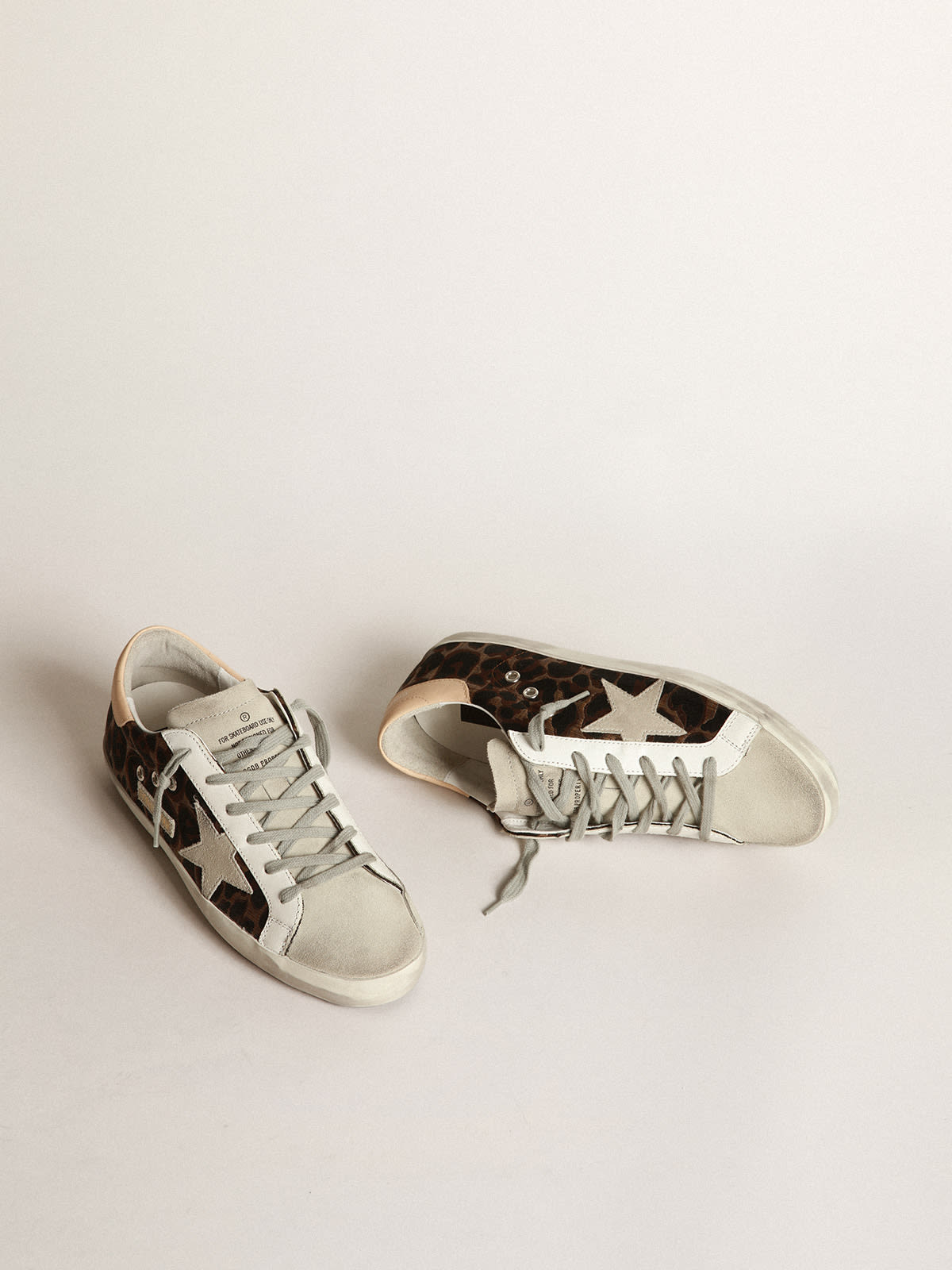 Golden goose superstar python & leopard print on sale sneakers