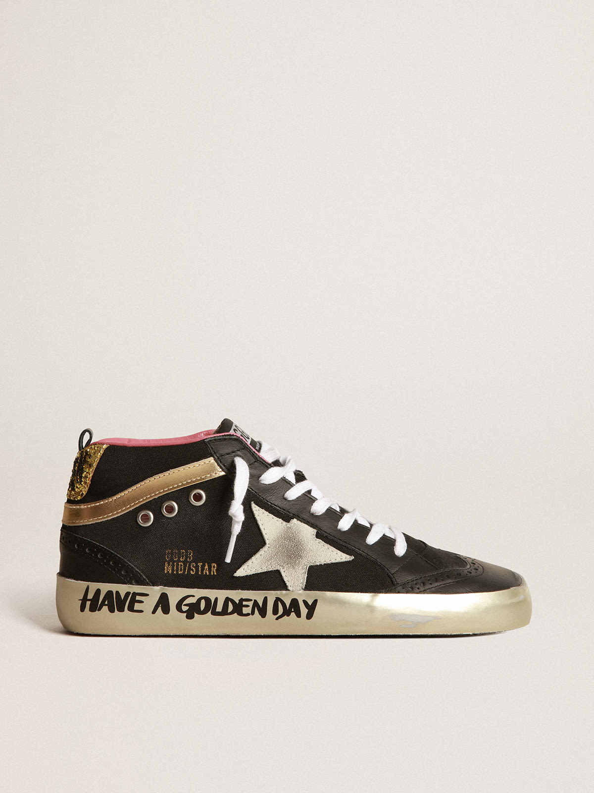 Black Mid-Star sneakers with gold-coloured inserts and glitter | Golden  Goose