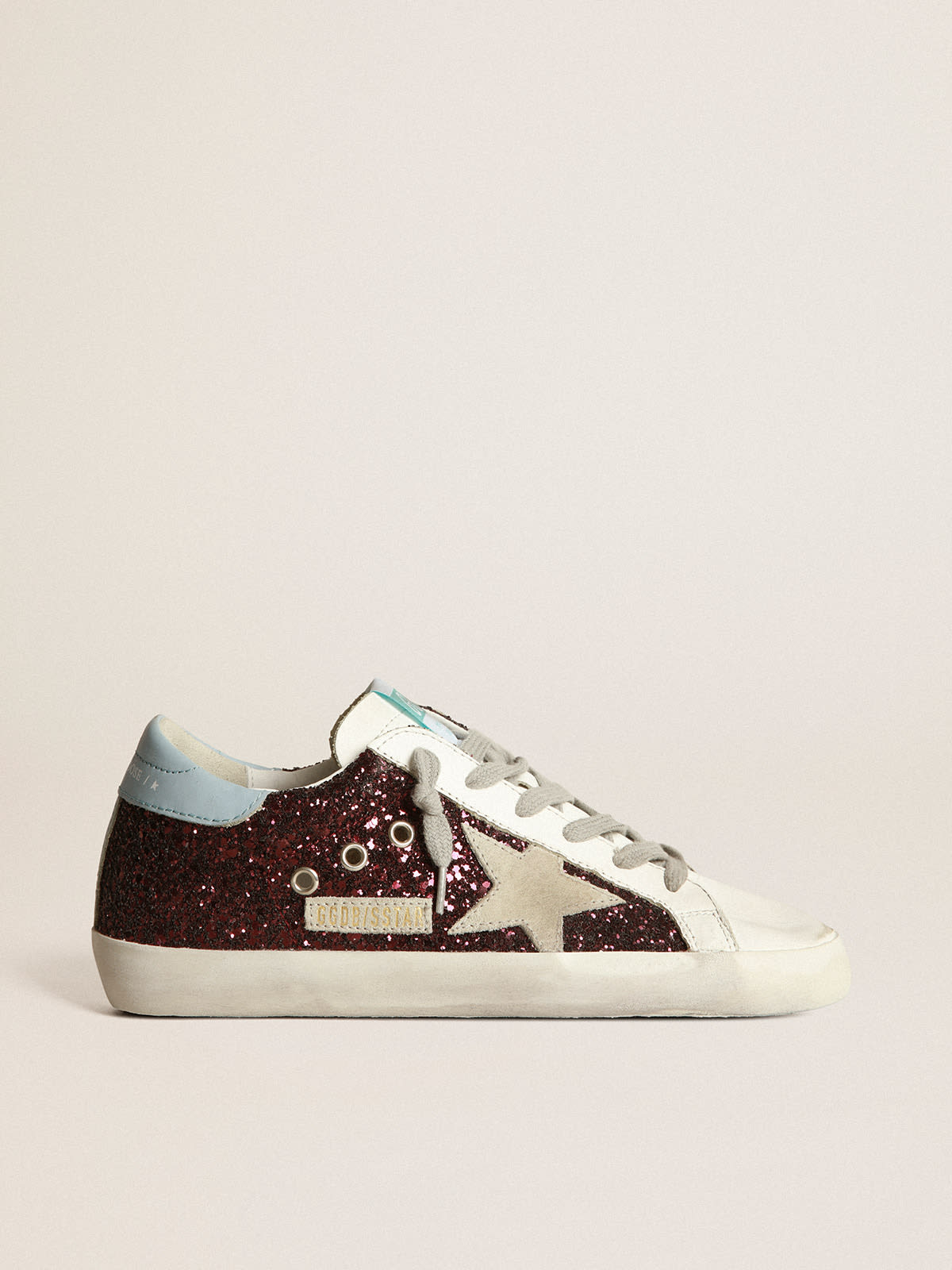 Super Star sneakers in burgundy glitter with ice gray suede star and light blue leather heel tab