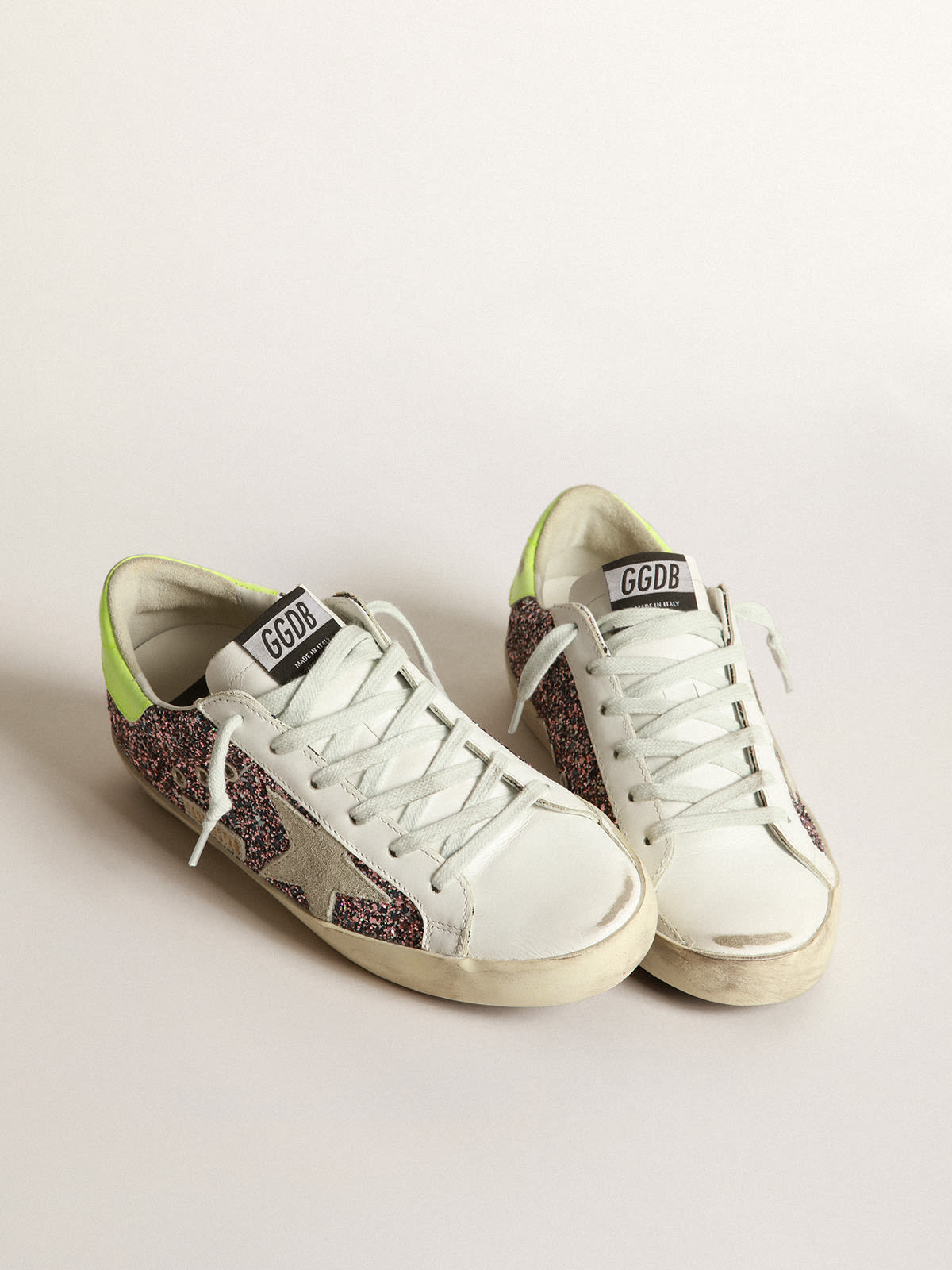 Super-Star sneakers in gray and pink glitter with ice-gray suede star and  fluorescent yellow leather heel tab | Golden Goose