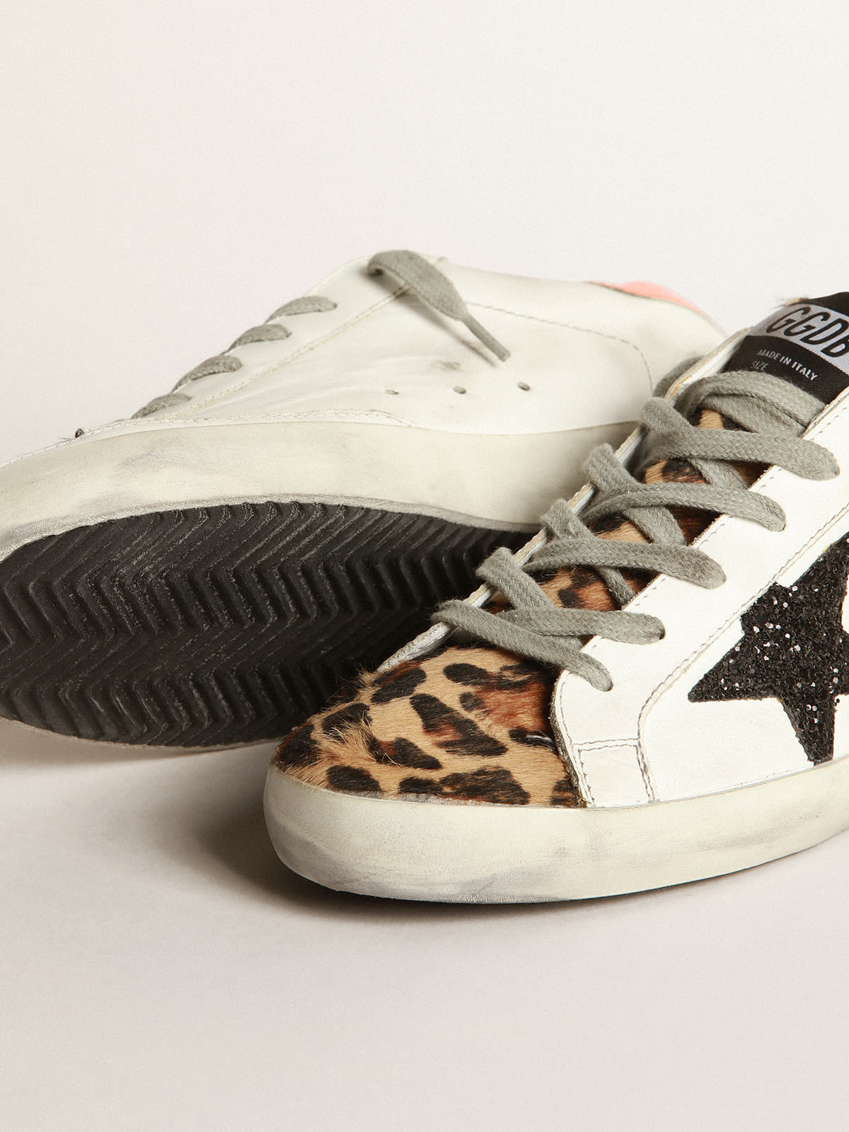 Golden Goose - Super-Star sneakers with leopard-print insert, glittery star and orange heel tab in 