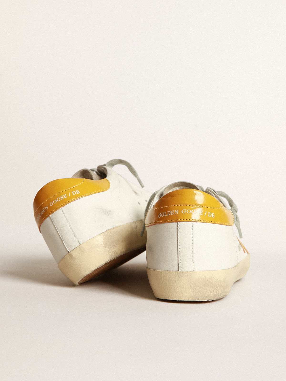 Golden goose hot sale yellow sneakers