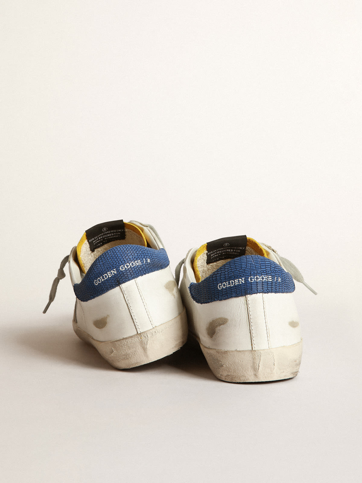 Golden Goose - Two-tone Super-Star sneakers with yellow lizard-print insert in 