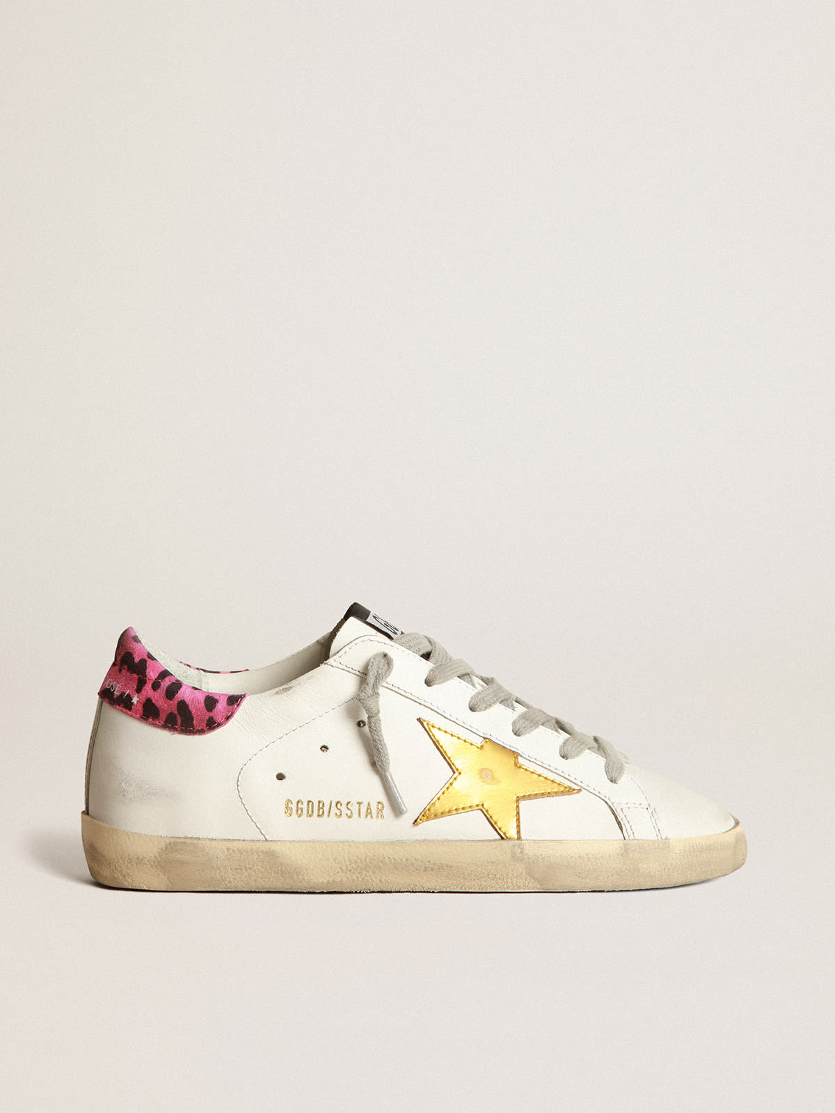Super-Star sneakers with gold laminated leather star and fuchsia leopard- print suede heel tab | Golden Goose