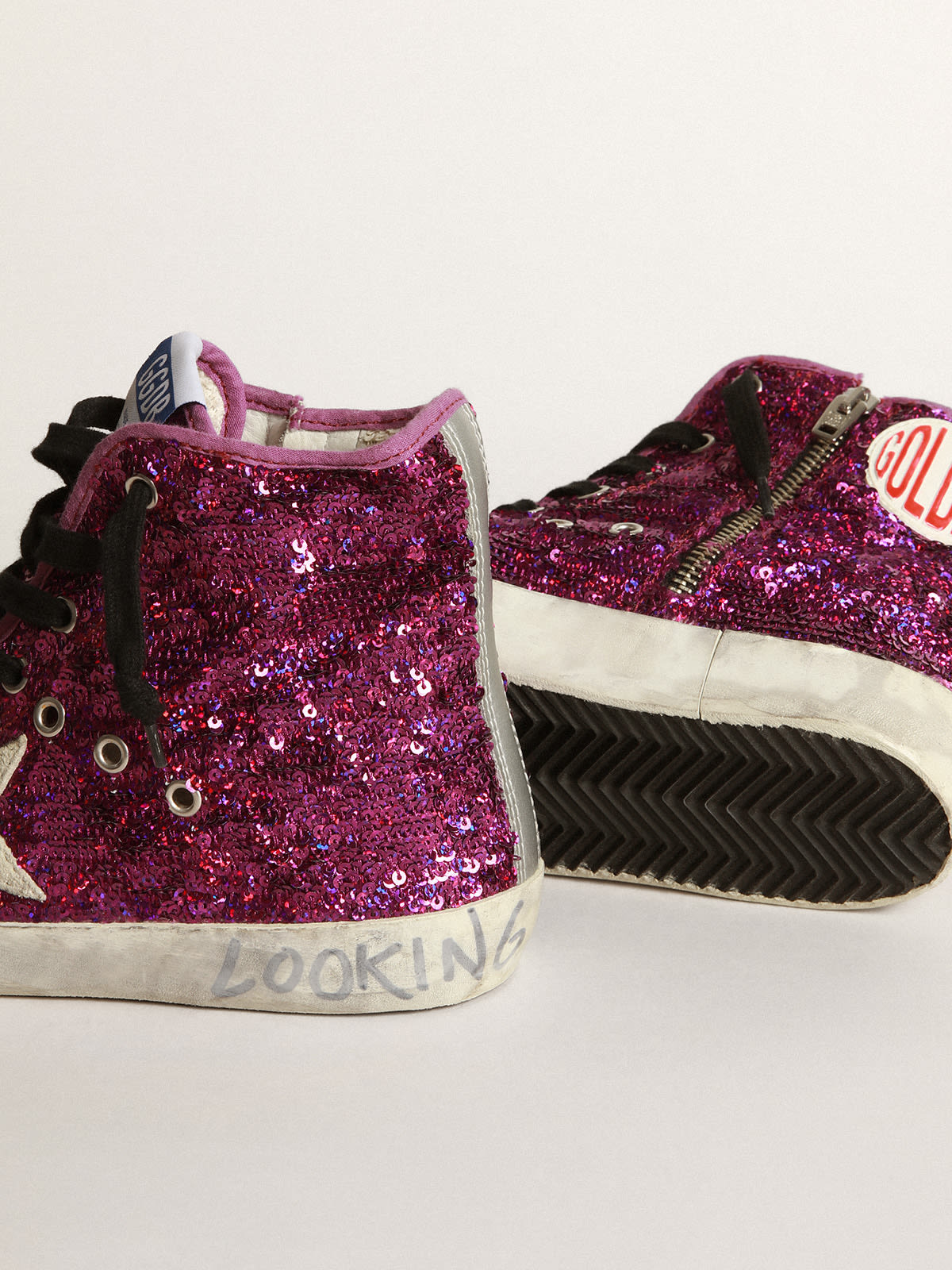 Francy sneakers with sequins and handwritten lettering on the