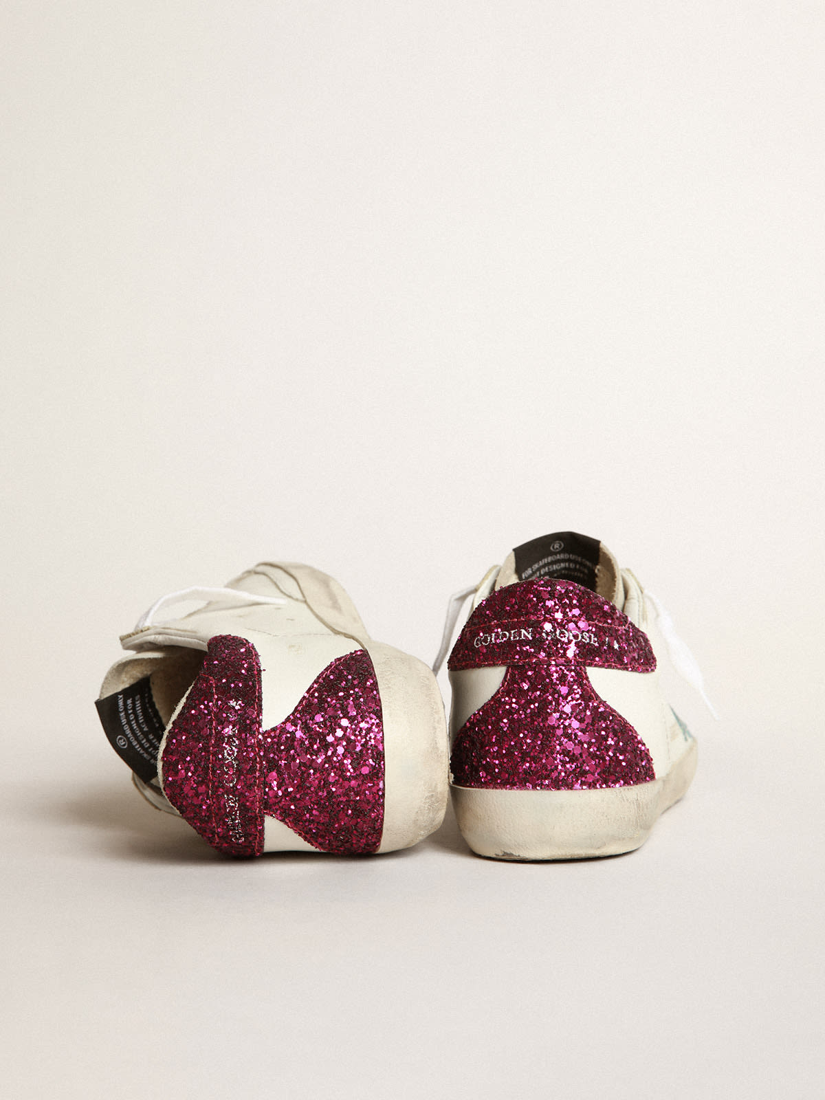 Golden Goose - Sneaker Super-Star con stella in glitter azzurri e talloncino in glitter viola in 
