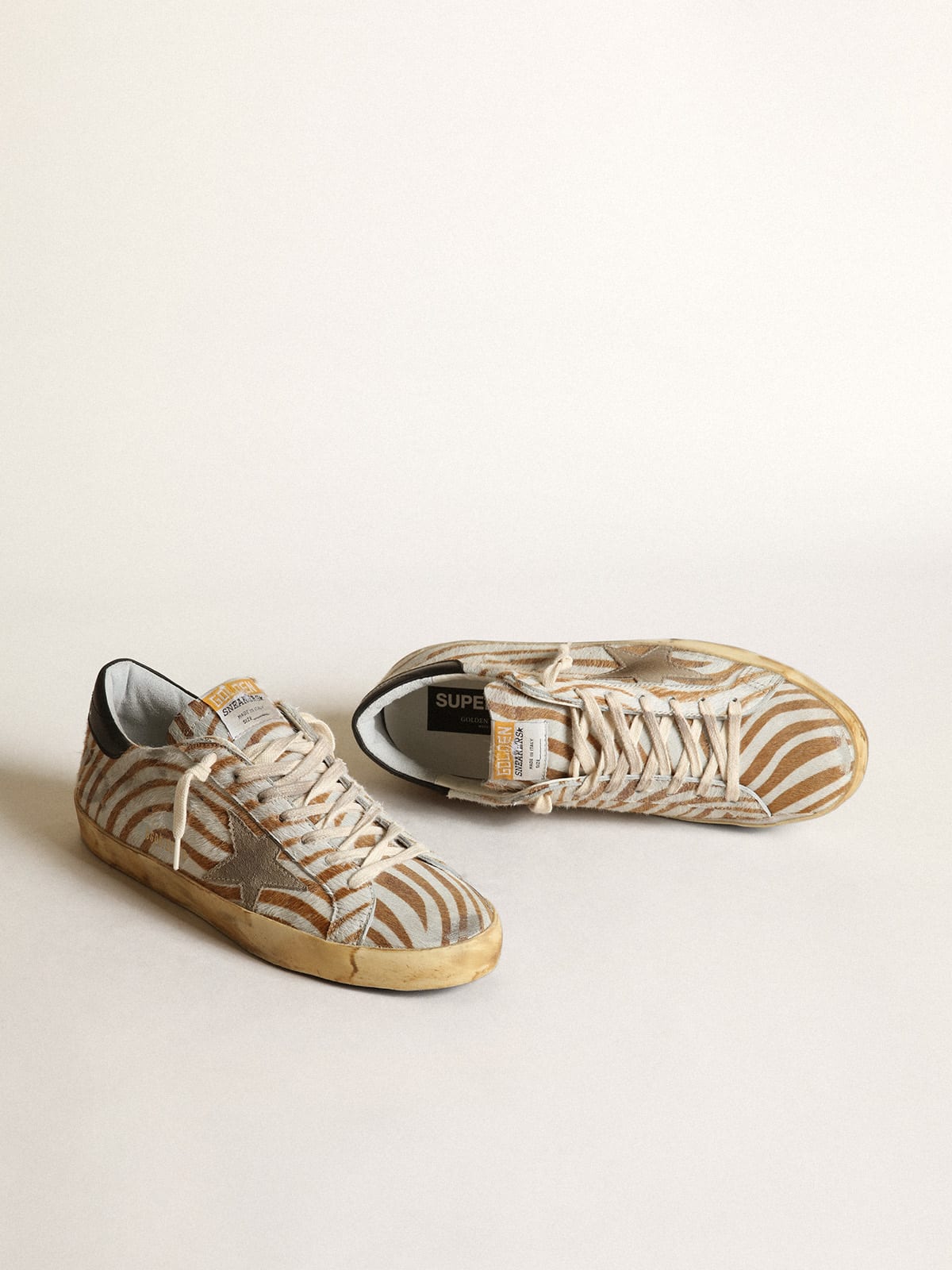 Golden Goose - Men’s Super-Star sneakers in zebra-print pony skin with dove-gray suede star in 