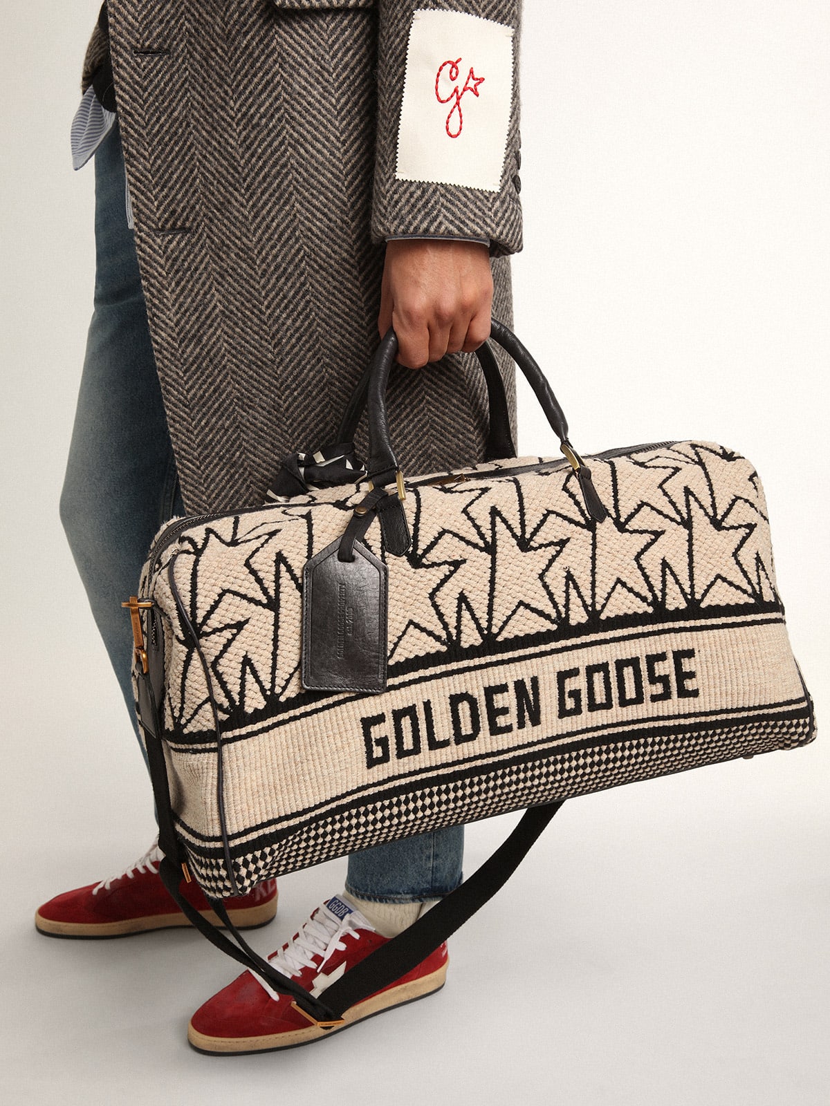 Men's duffle bag in milk-white jacquard wool and black lettering