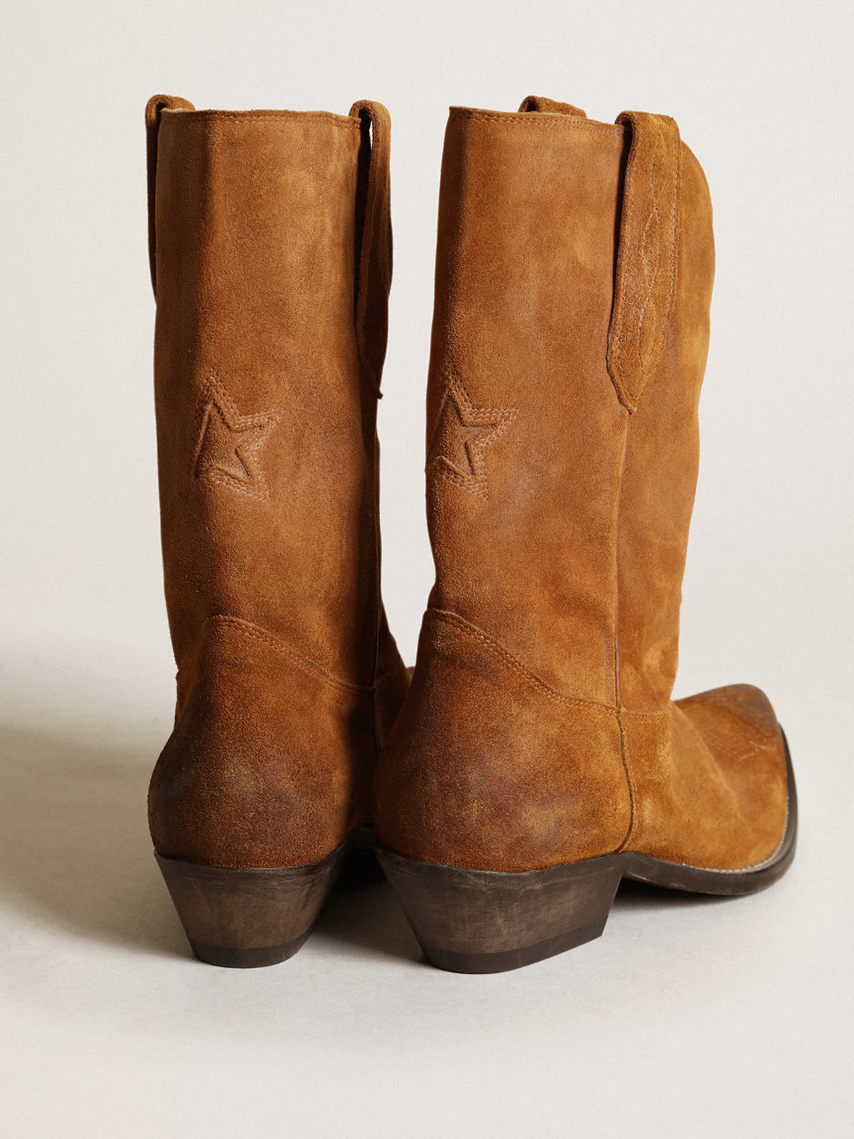 Women's low boots in tobacco-colored suede with inlay star