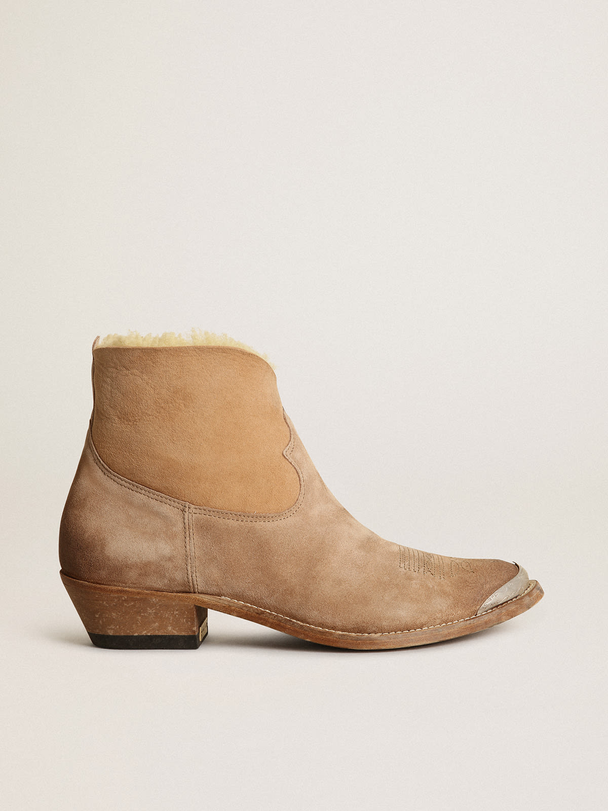 Women's ankle boots in tobacco-colored suede with shearling lining