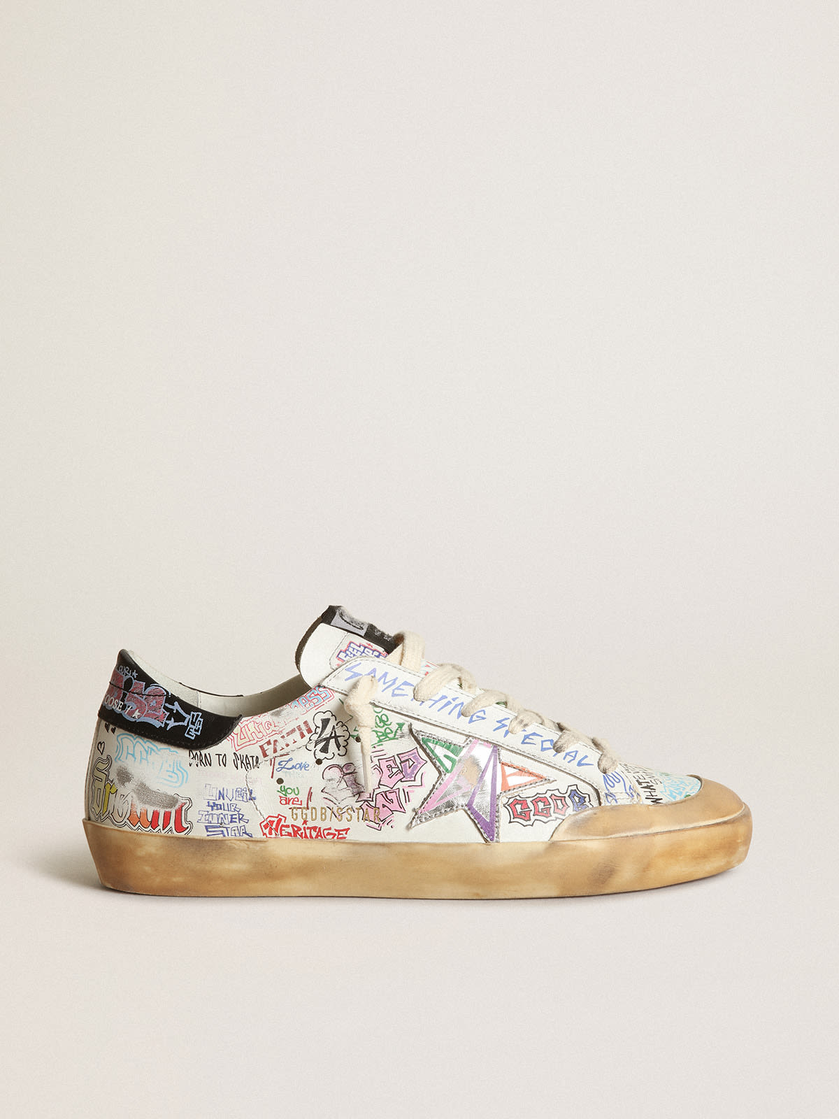 Golden Goose - Women’s Super-Star Penstar sneakers in white leather with all-over multicolored lettering in 