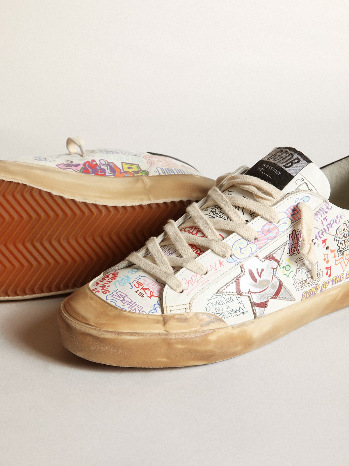 Golden Goose - Women’s Super-Star Penstar sneakers in white leather with all-over multicolored lettering in 